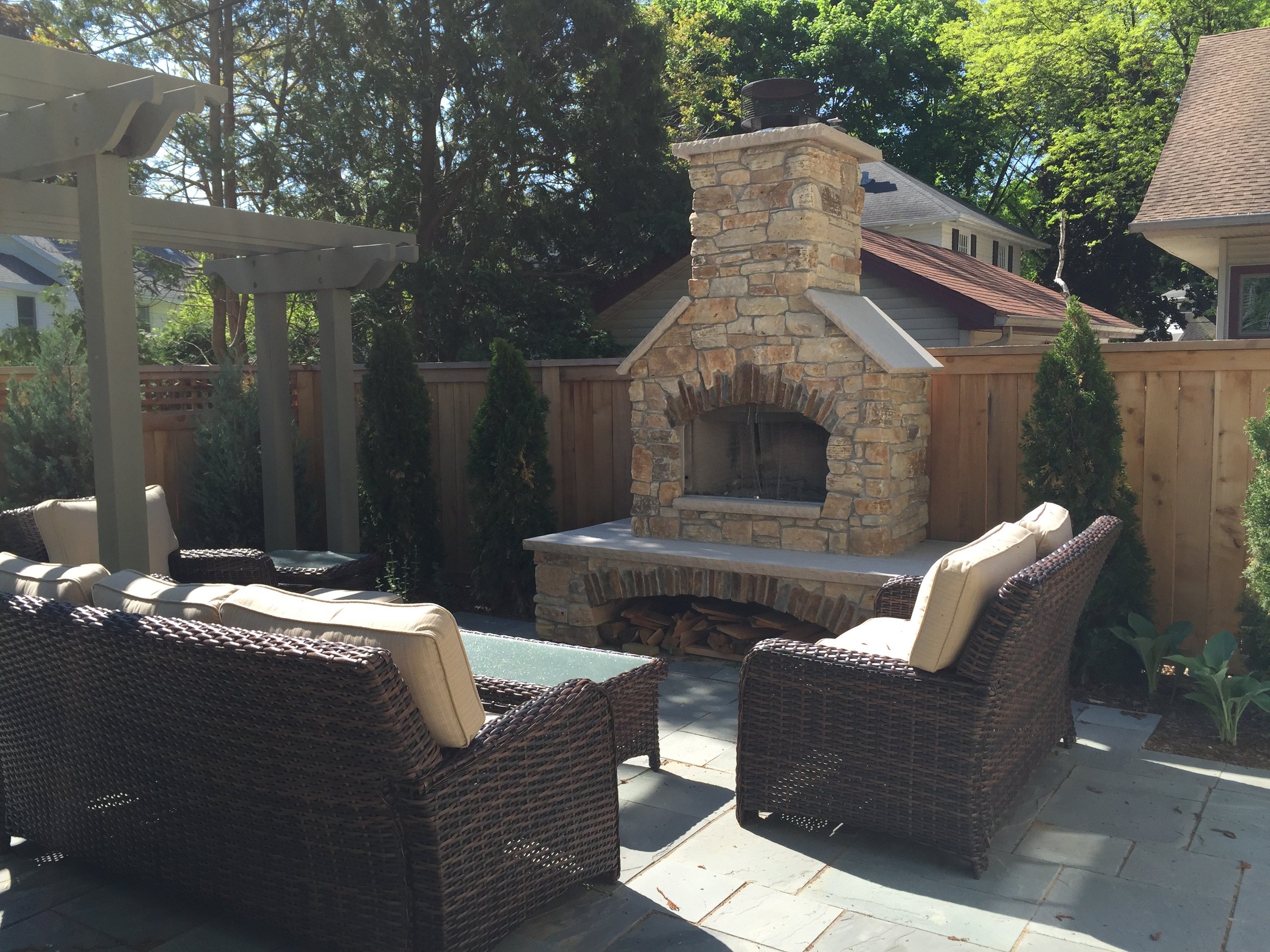 Stylish paver patio in Madison, WI with integrated landscape features