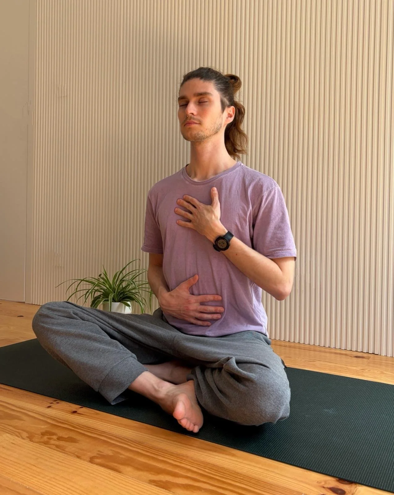 man meditating and doing breathwork