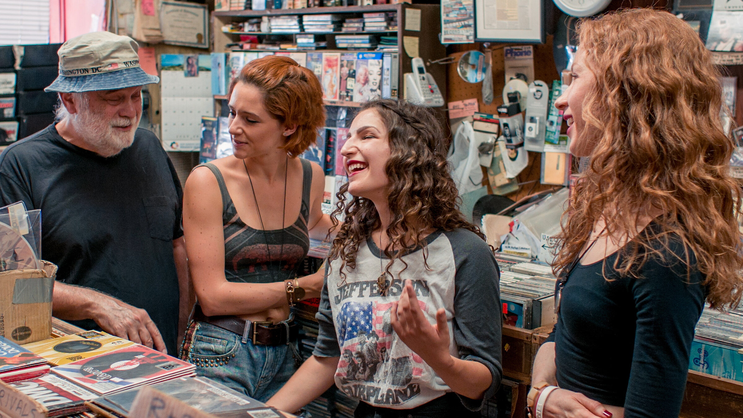 (from left to right) Victor Barranca, Sparkman Clark, Sarah Sumner and Carla Mueller share the afternoon in Park Slope's Fifth Avenue Record Shop 