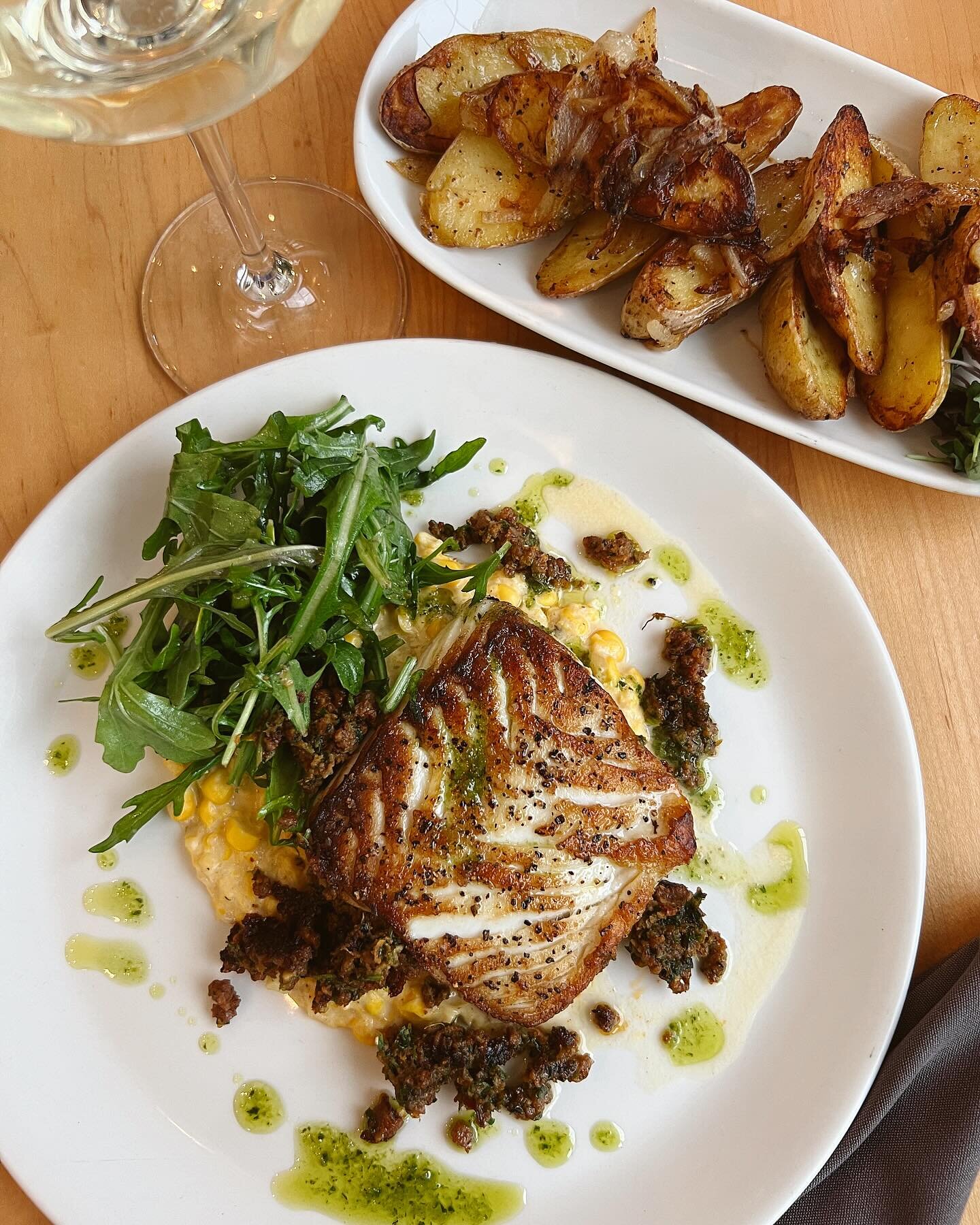 One of our favs!! Atlantic Halibut with Chorizo, Gremolata, Creamed Corn &amp; Basil Oil + Duck Fat Fingerling Potatoes!