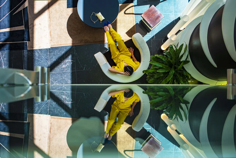 Guest seating and architectural details in theWit Hotel lobby