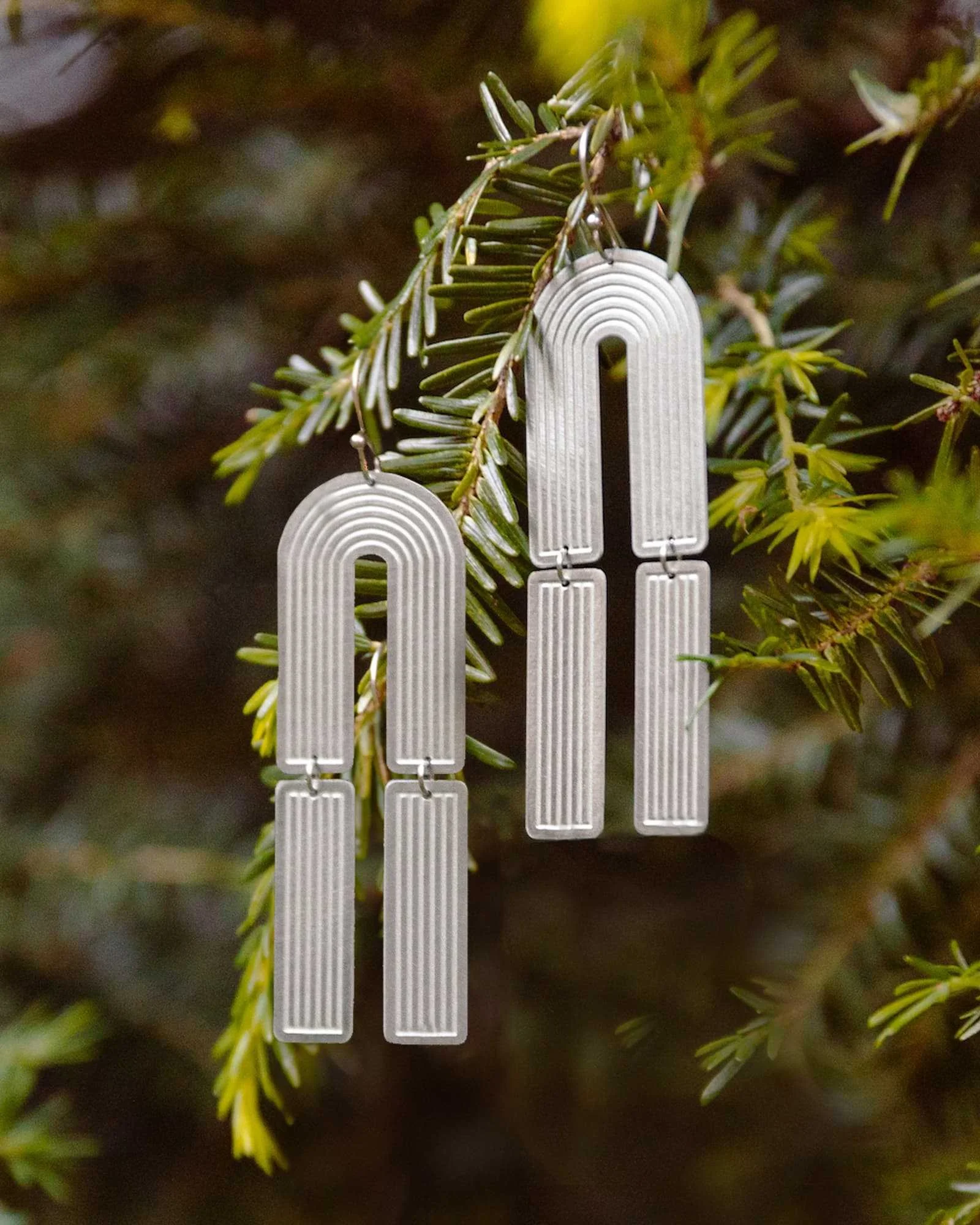 spectrum-of-divinity-sustainably-eco-ethically-handmade-silver-rainbow-pride-statement-earrings-portrait.jpg