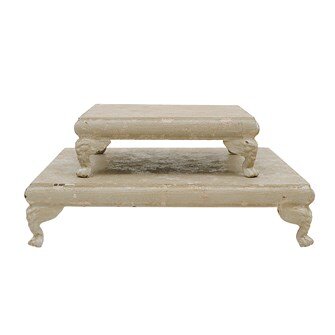 Two Cream-Colored Metal Pedestals