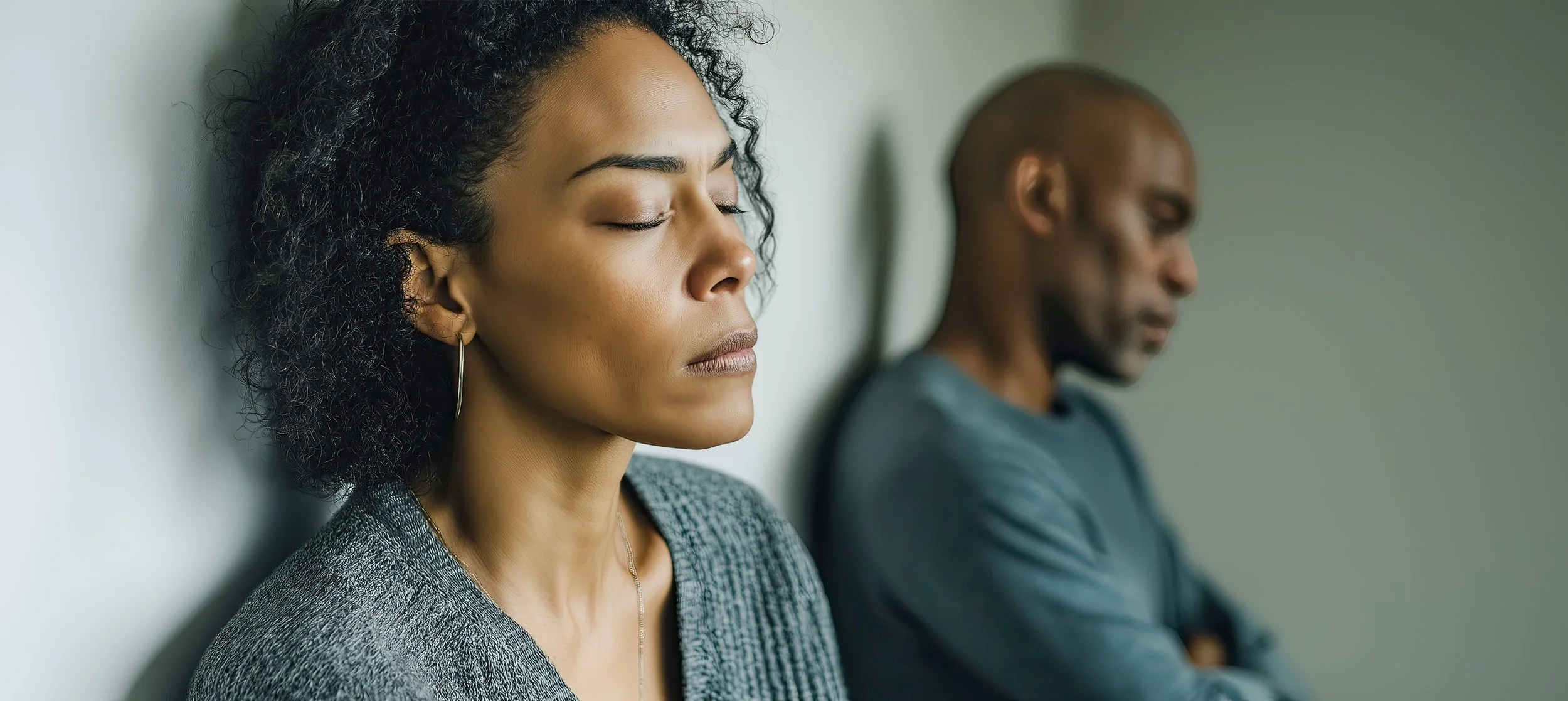 couple-sitting-apart-silence
