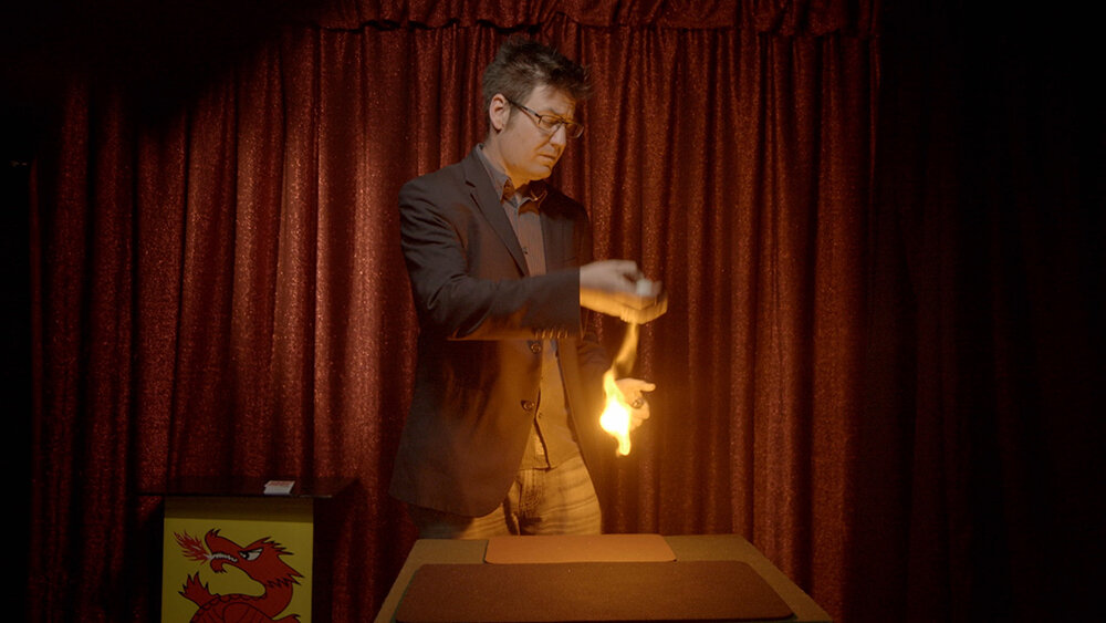 Dr. Gustav Kuhn conducting a magic trick