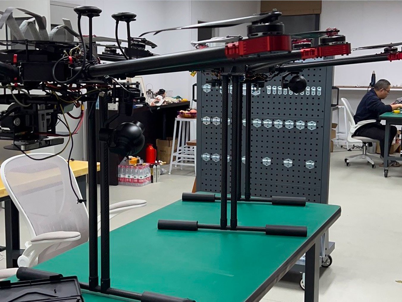 A pair of our RDST off-the-shelf delivery drones await final quality control testing.