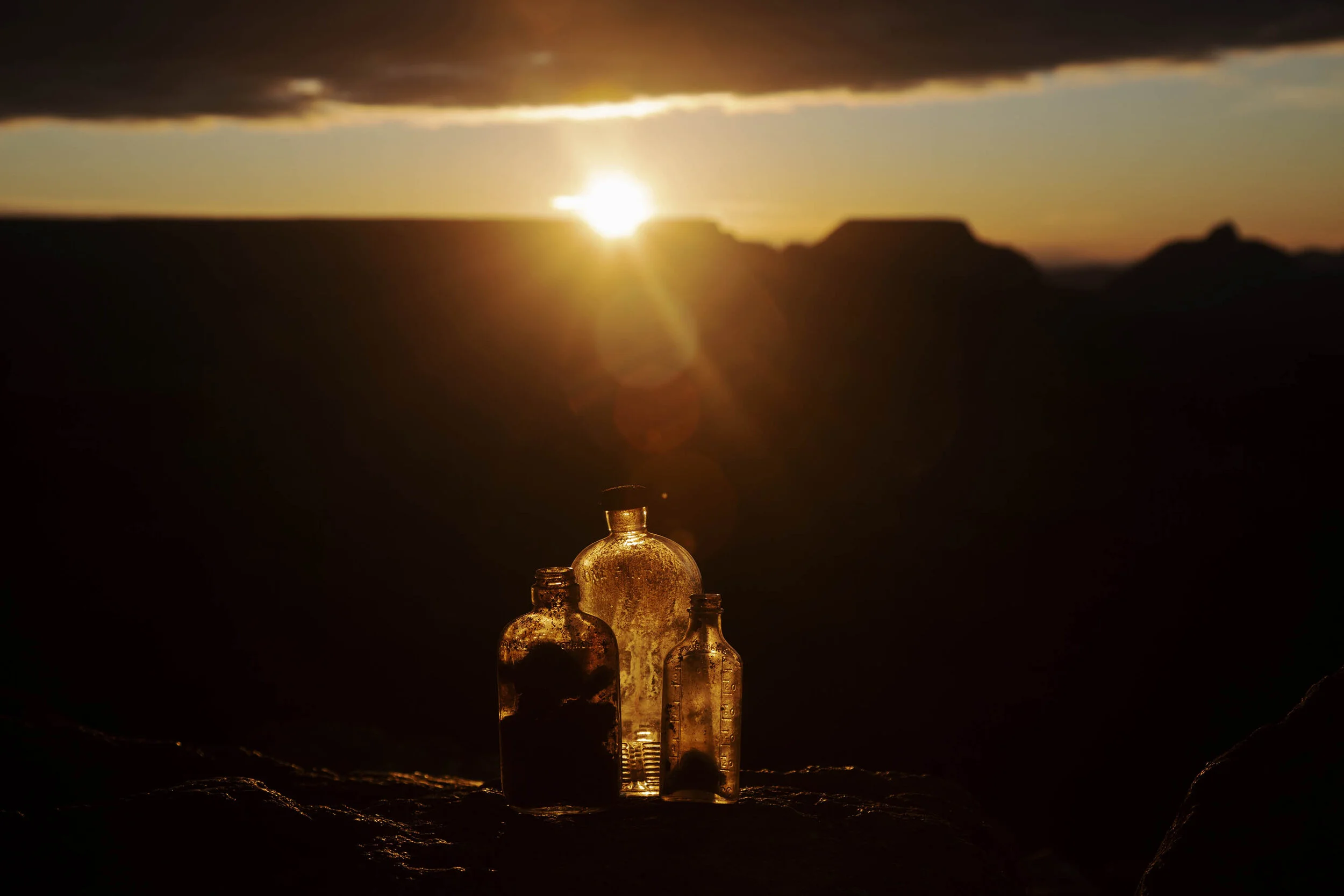 598A5941_Grand Canyon sunrise and bottles in focus_TO PRINT.jpg