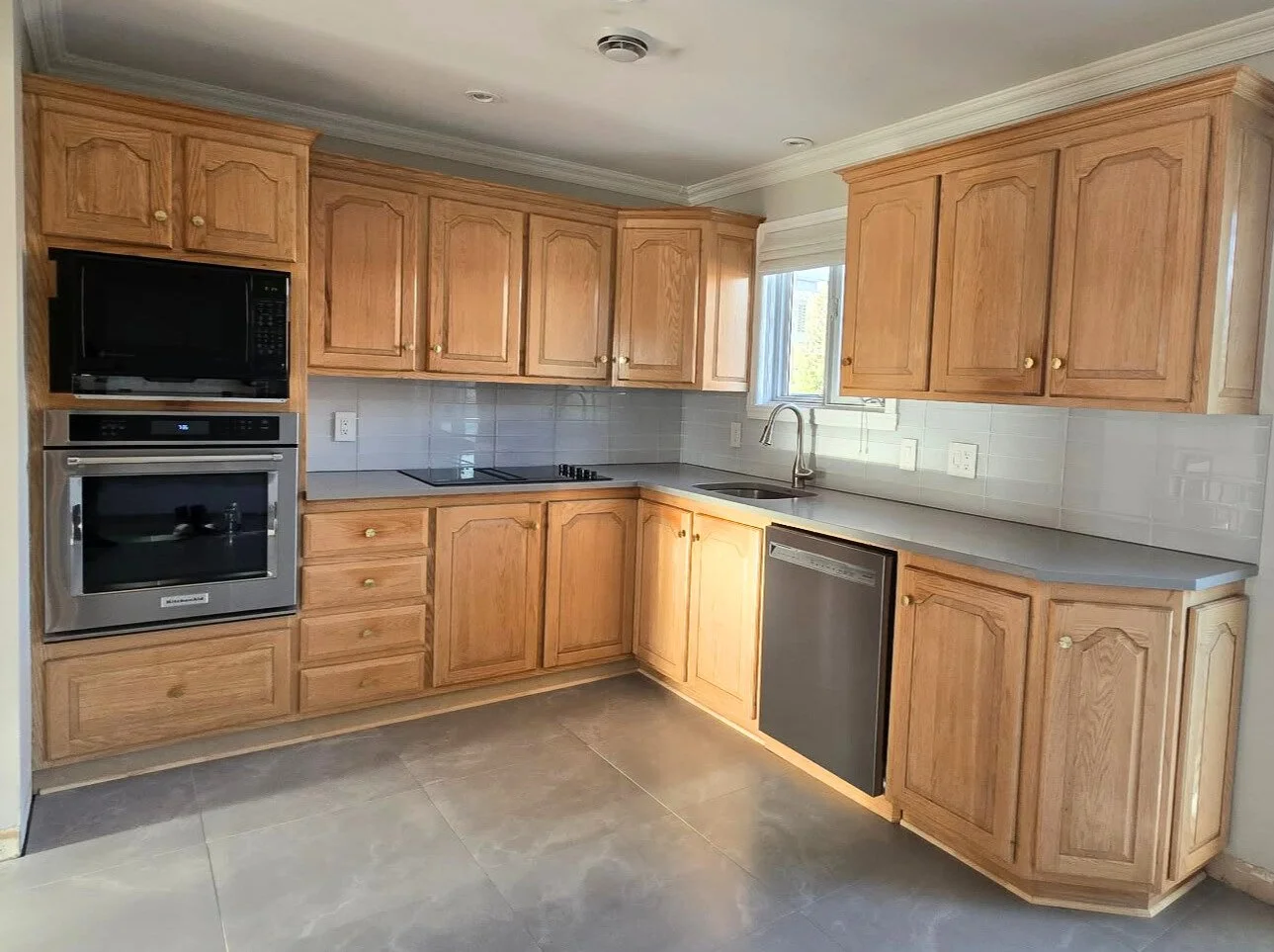 cabinet refinishing project before