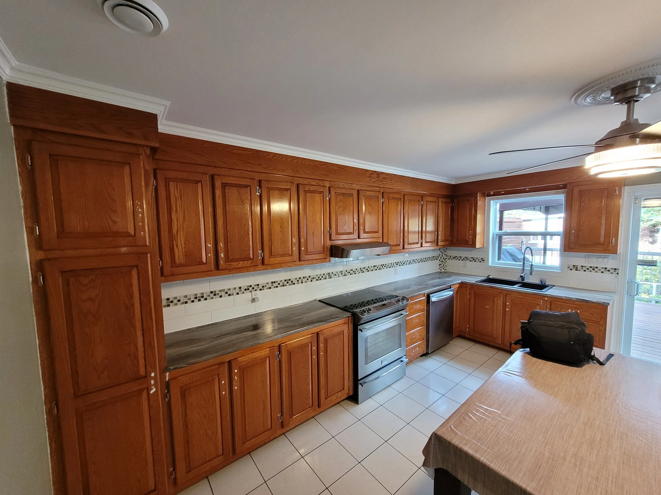 Avant après peinture d'armoires de cuisine à Longueuil