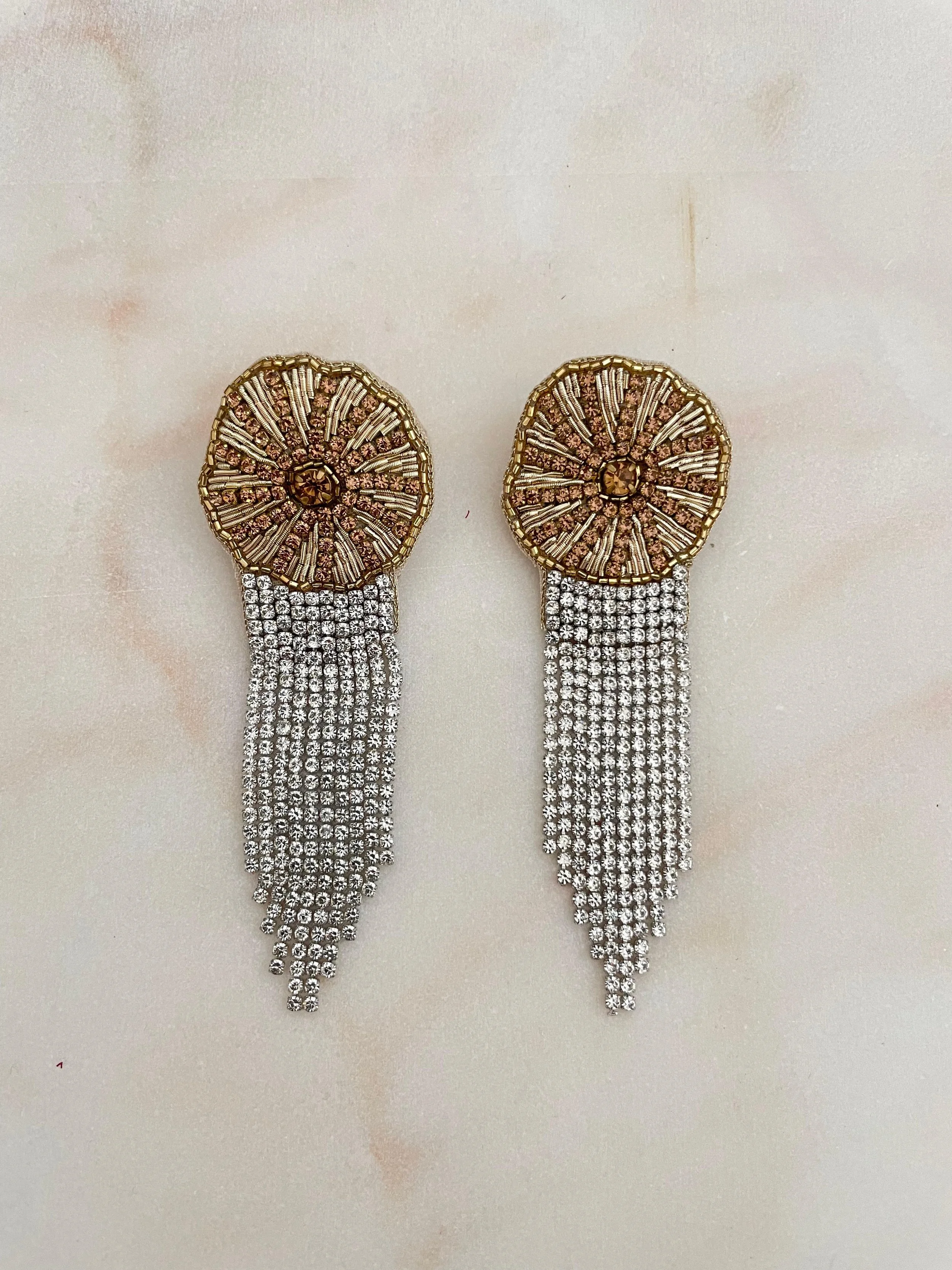 Orecchino fiore e cascata