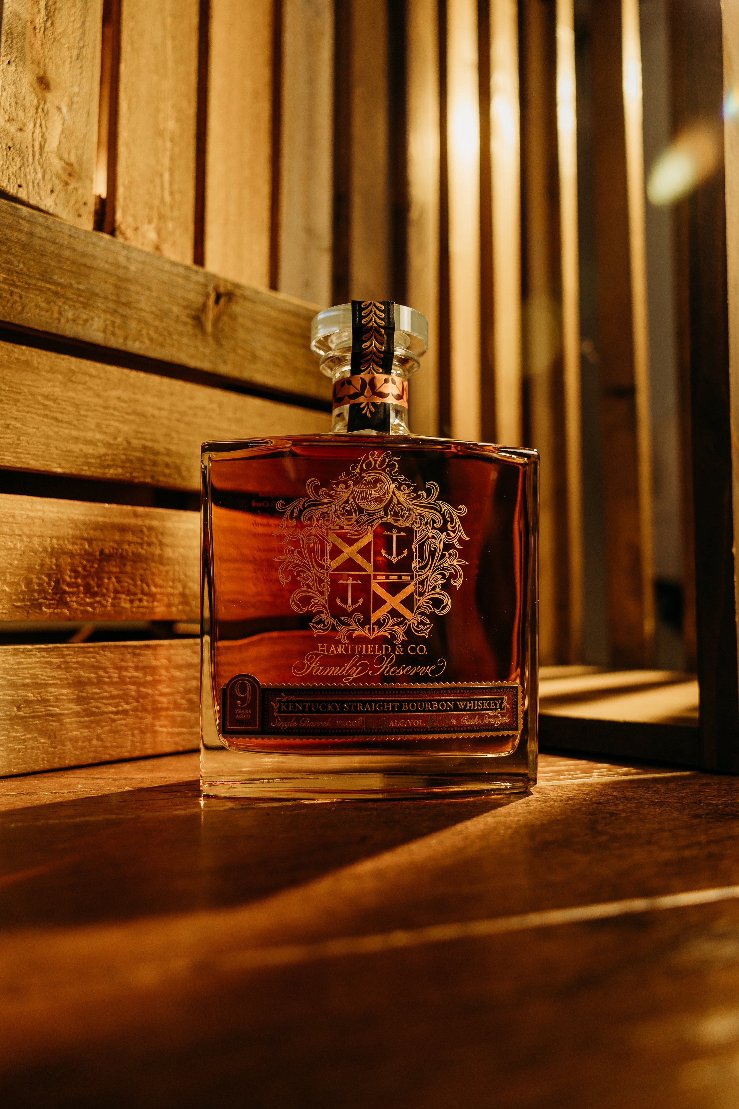 Five iconic bottles from across the globe: Blanton's Gold, Black, Red, Green, and highly sought-after Straight From the Barrel/