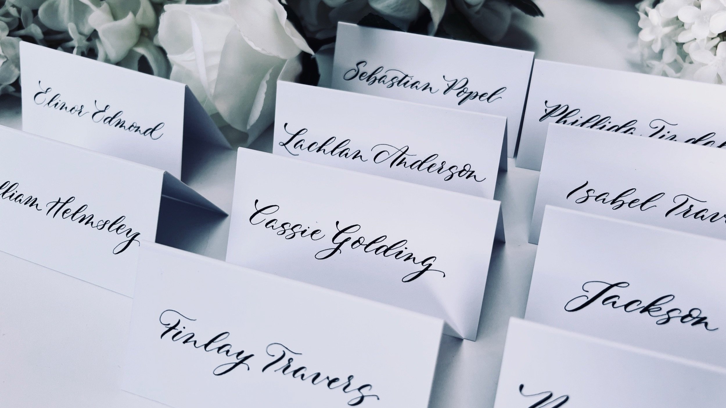 Delfont+Ink+slanted+modern+wedding+event+calligraphy+placecards.jpg