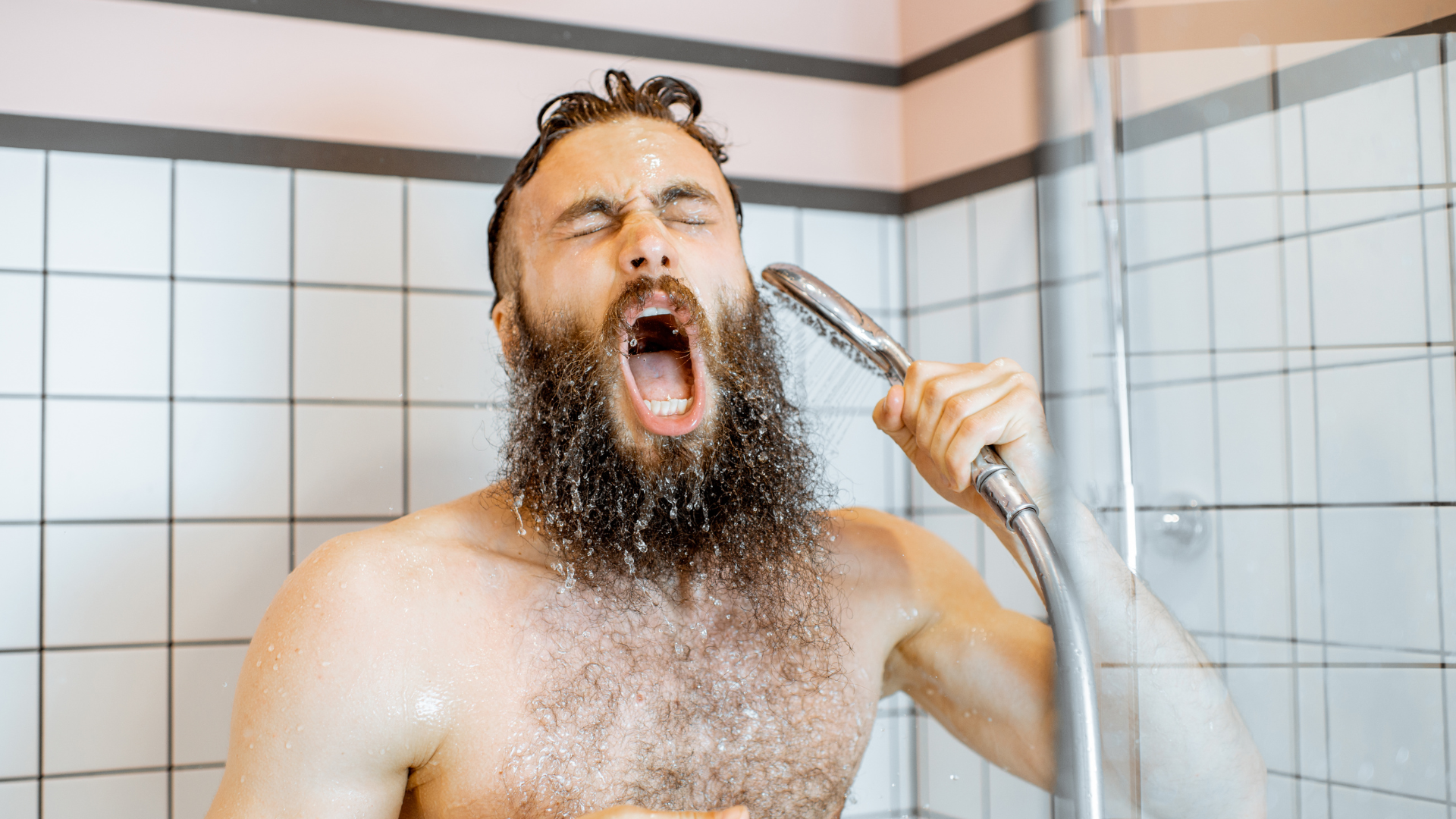 Person taking a cold shower to increase energy during the day and sleep better at night.