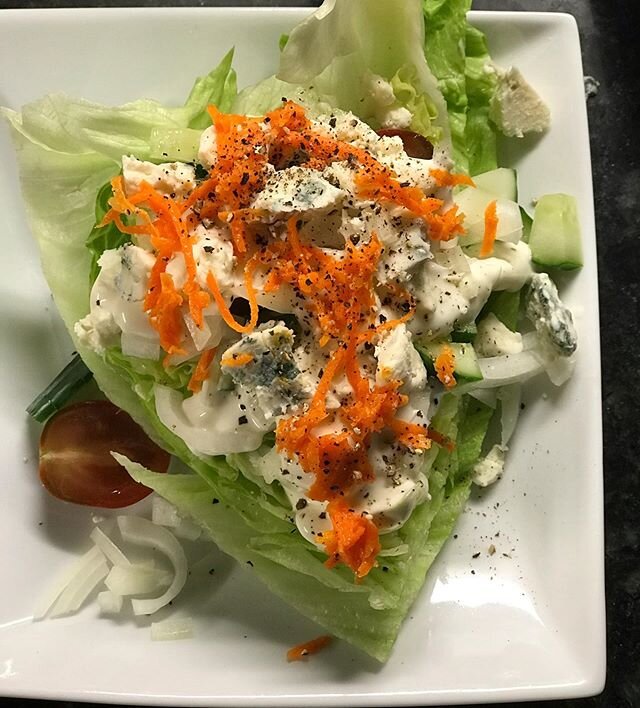 The Wedge Salad with a Twist! My fams fave! The twist - shredded carrots with garlic, EVOO and lemon. So many vitamins and so GOOD!