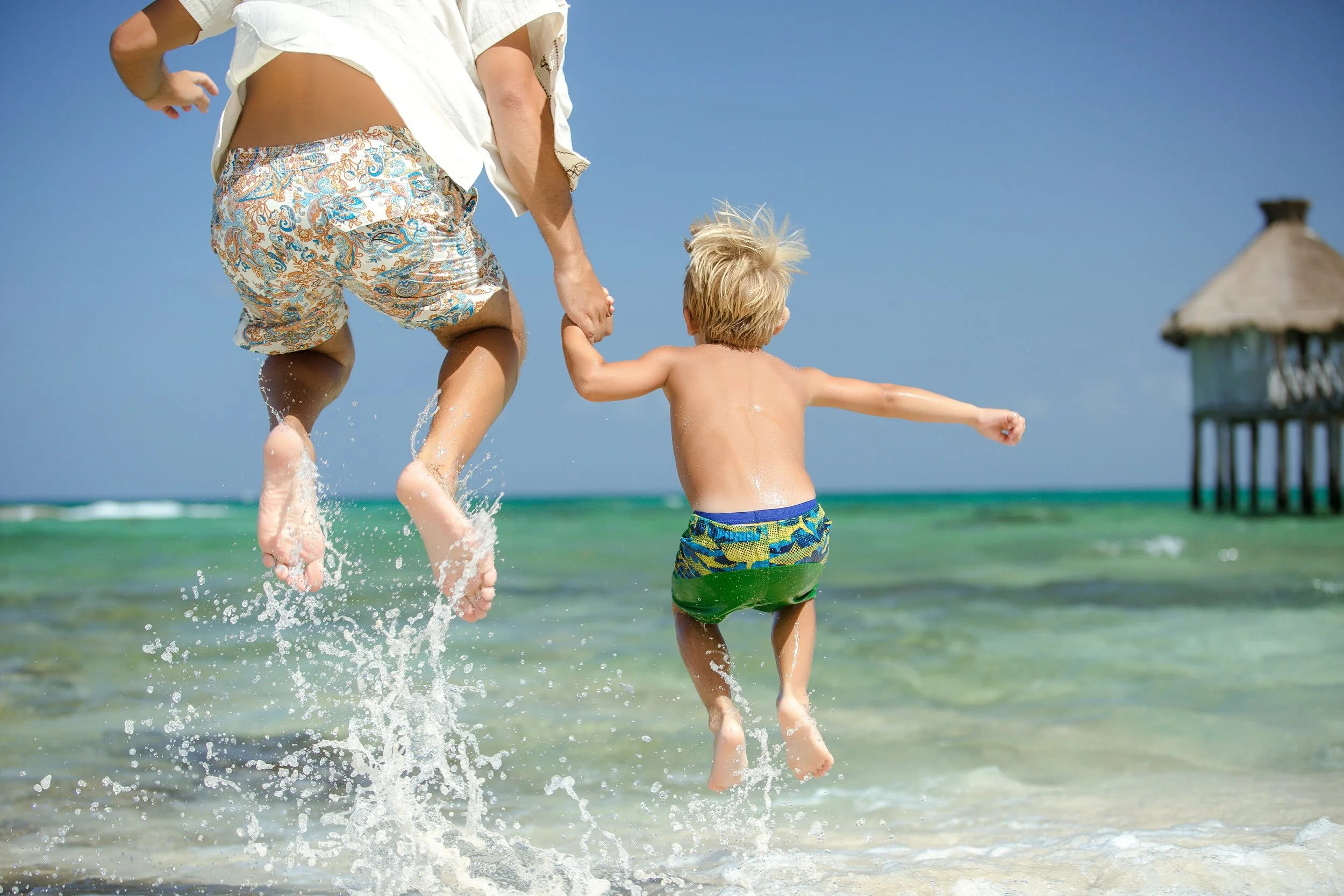 VID_RM_Beach_Day_Boy_Dad_Jump.jpg