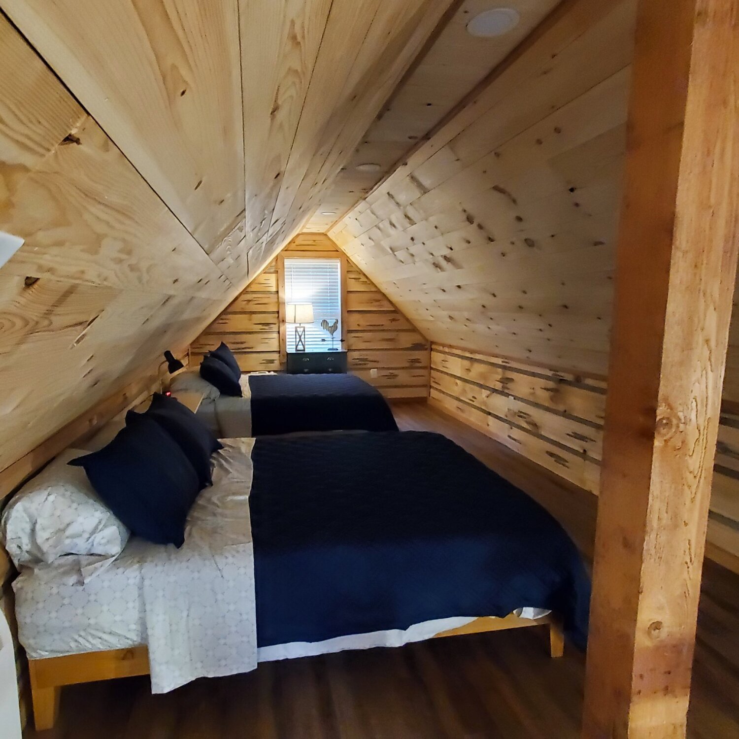  Diane and Eric did an amazing job making the cabins cozy and inviting. We especially love how each of the bedrooms is full of character and individuality - they let those knots shine!  