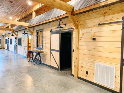  While many folks would have balked at the thought of turning a smelly wood and concrete horse barn into their dream home, the Hawkin's dove in head first! 