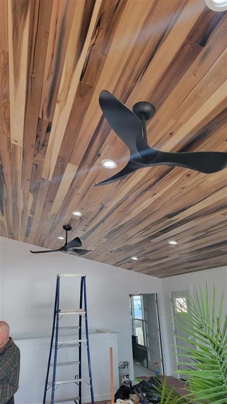 Rainbow poplar tongue and groove used as a wood feature in a commercial interior.