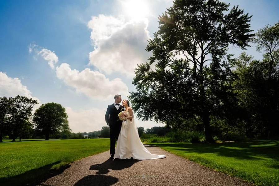 A Delgado Studios couple walking together on their wedding day