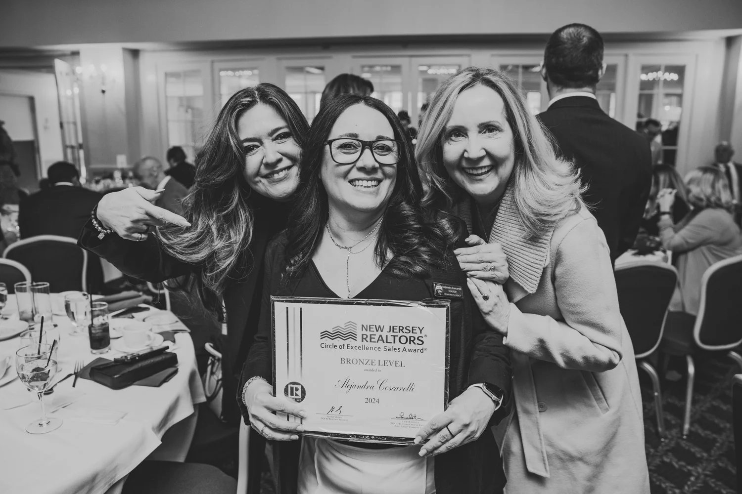 Corporate award recipients photographed at an event