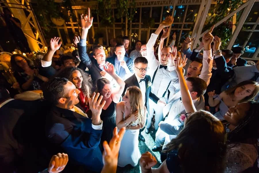 A lively wedding celebration photographed by Delgado Studios