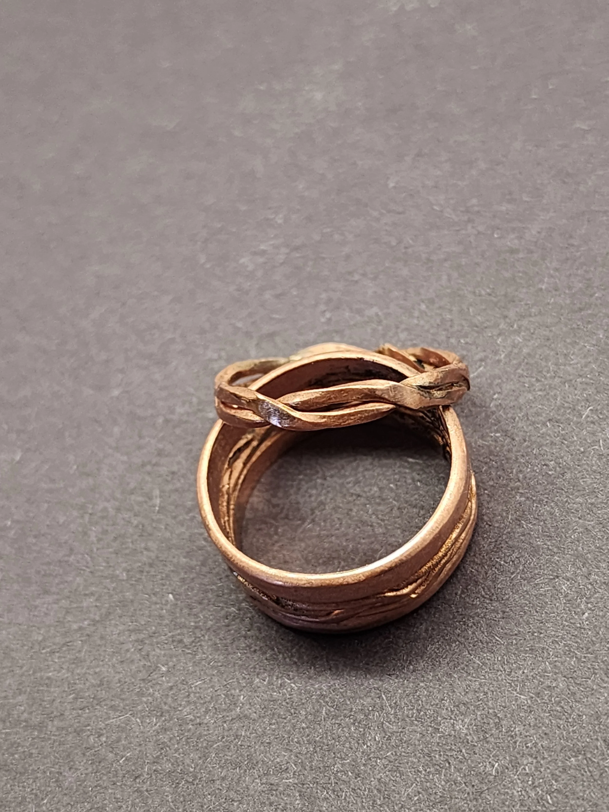 2 copper rings hammered with a twisting texture