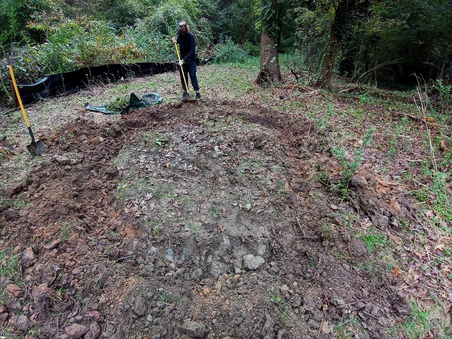  Rain beds are depressed areas where water can collect, simulating a marsh or wetland micro-ecology. By hollowing a pronounced depression in the lowest spot, water that had been collecting nearby is able to flow into the bed instead of muddying up th