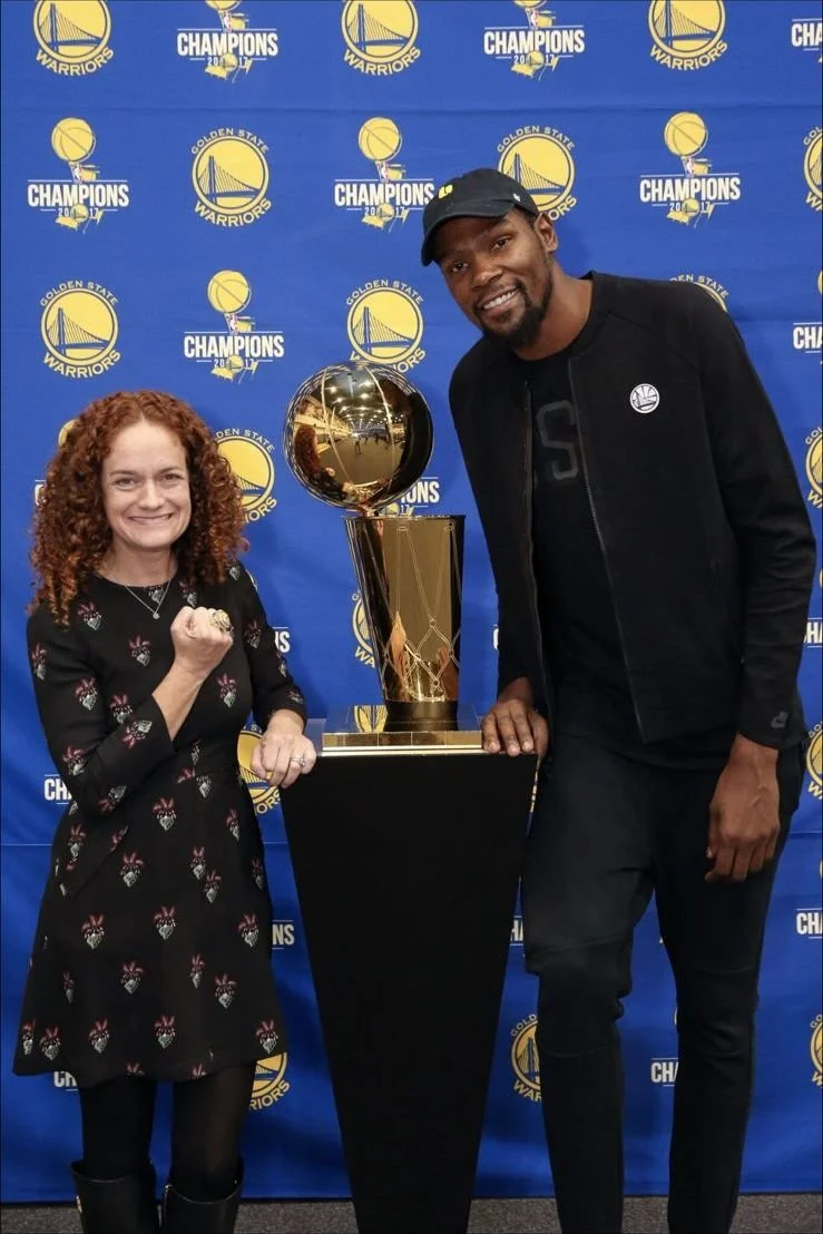 With the Warriors’ championship trophy
