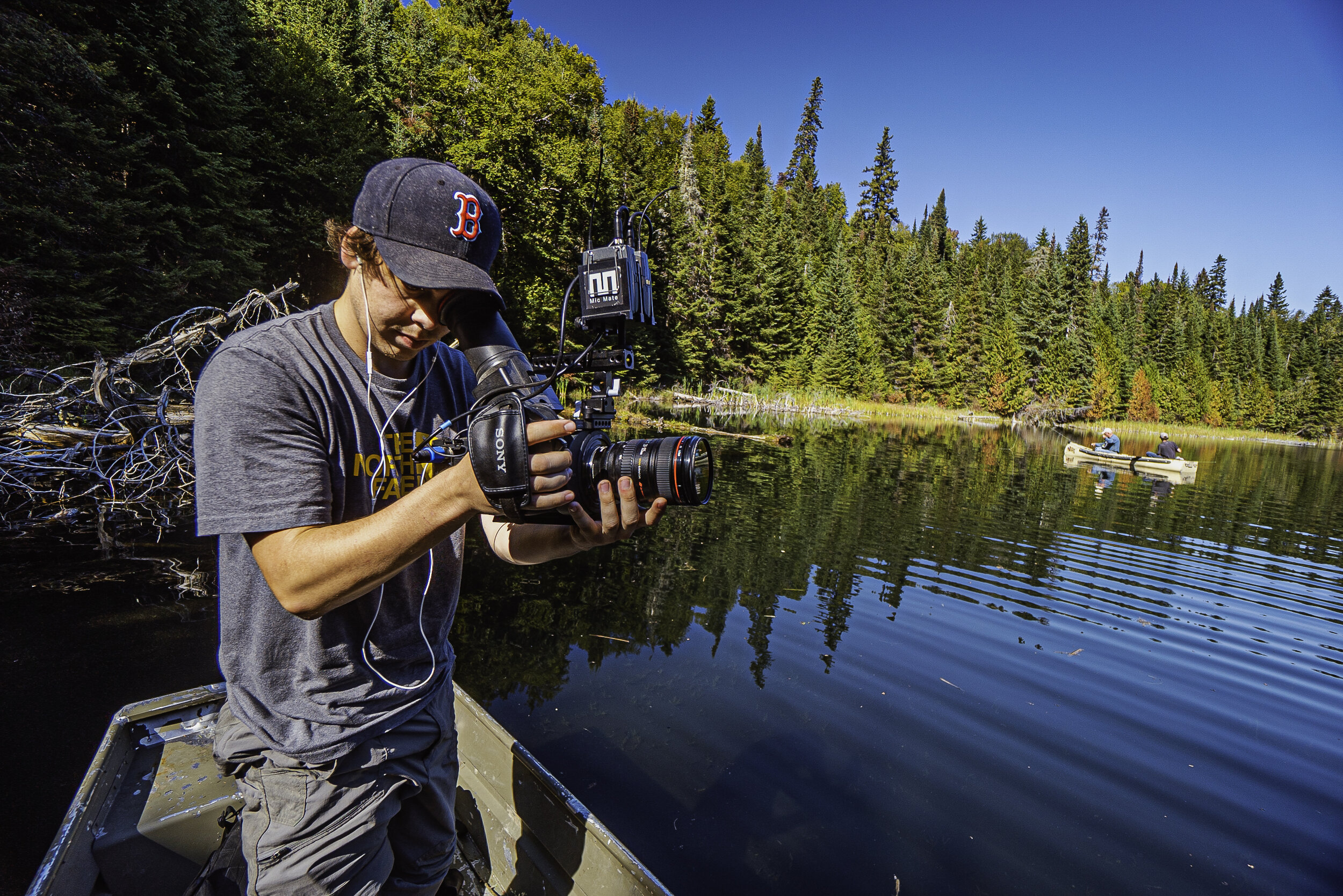 website 2021 _ edited Brett Filming from Canoe.jpg