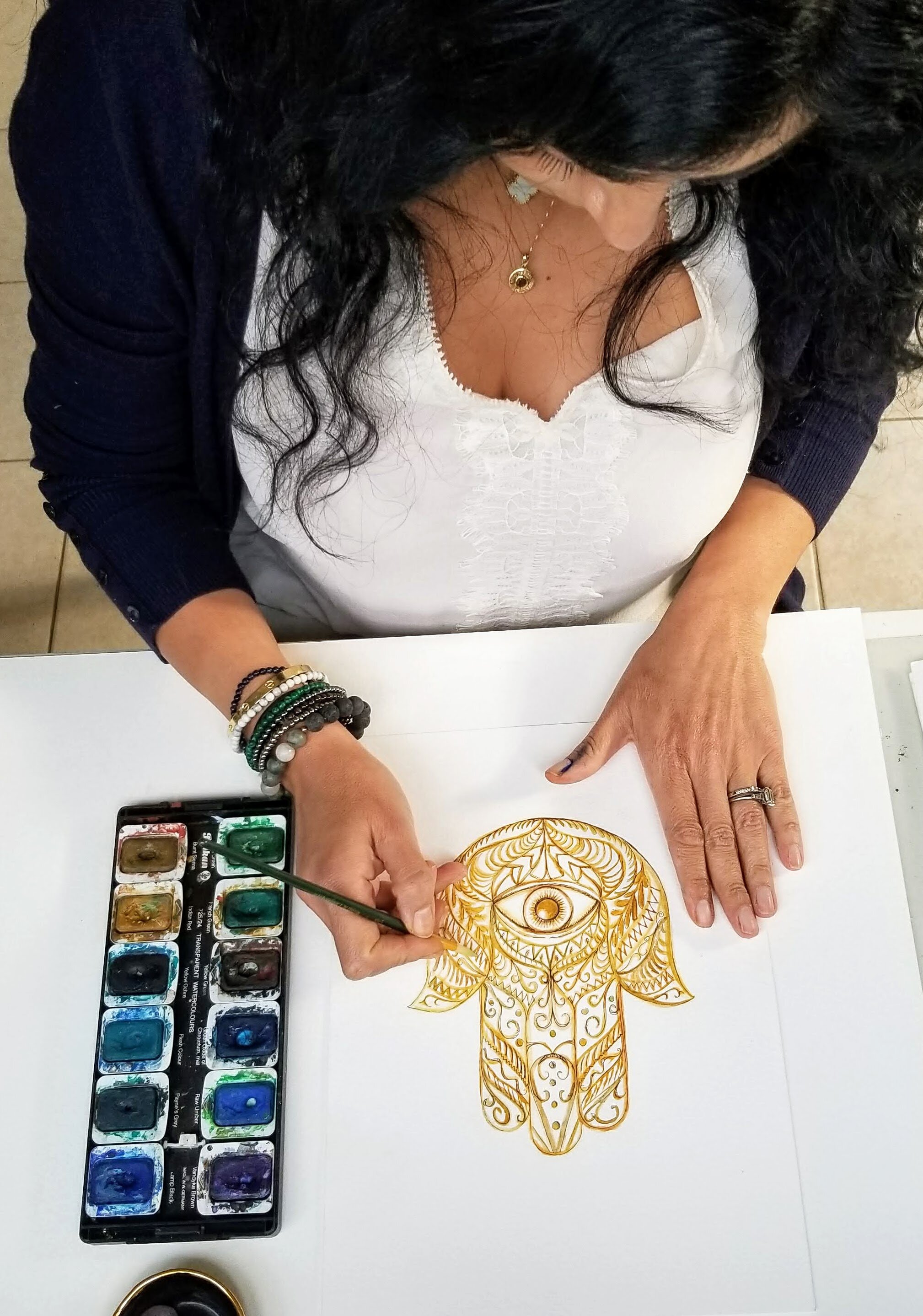 Tammy machmali in studio with hamsa.jpg