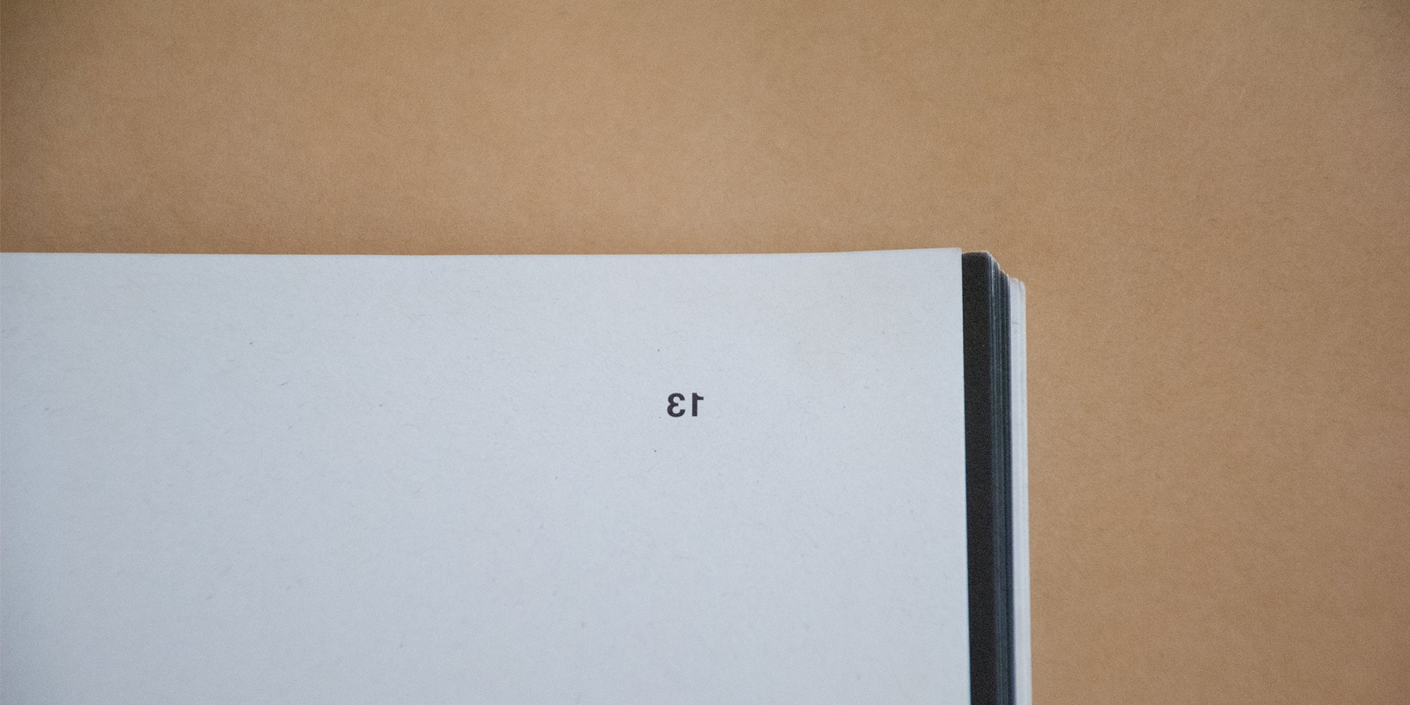 A page with an inverted page number on the upper right side. The number 13 is inverted too like inverted 3 and inverted 1.