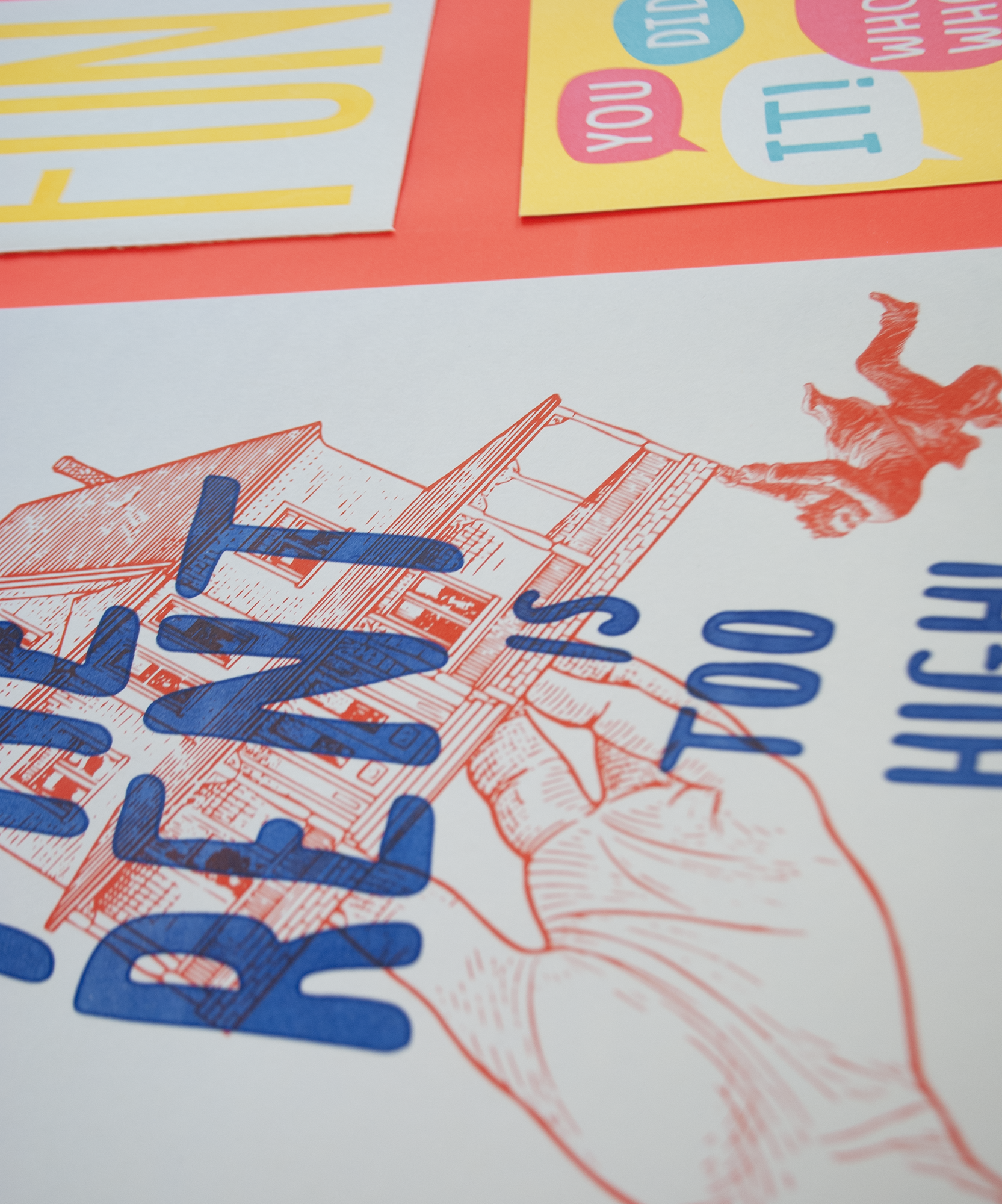 A close-up of the poster on the portion that shows the word RENT and the hand holding the house