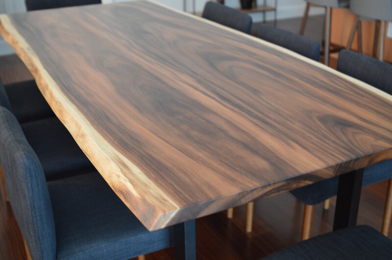 Wood slab table with metal legs