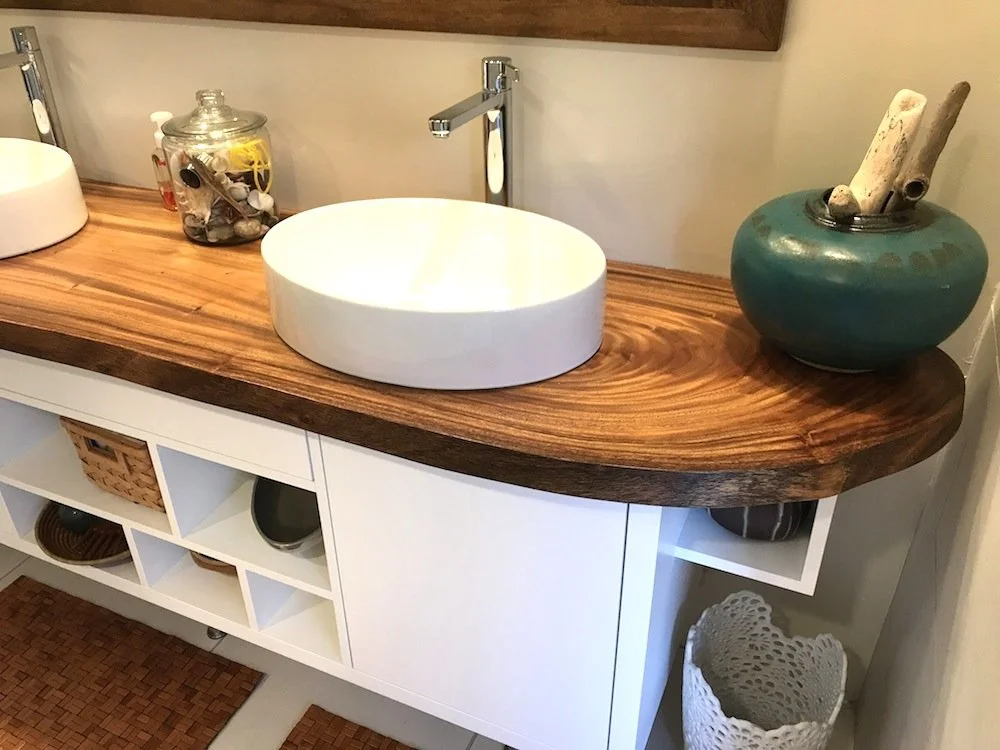 Custom vanity - white cabinets x monkeyopod countertop