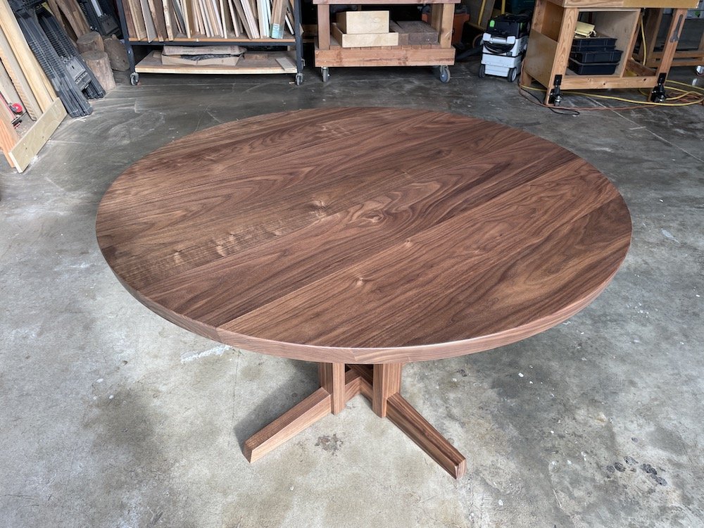 Round walnut dining table built in Hawaii