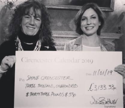 Voted top 3 charity in Cirencester 2019, receiving prize from Lady Bathurst.jpg