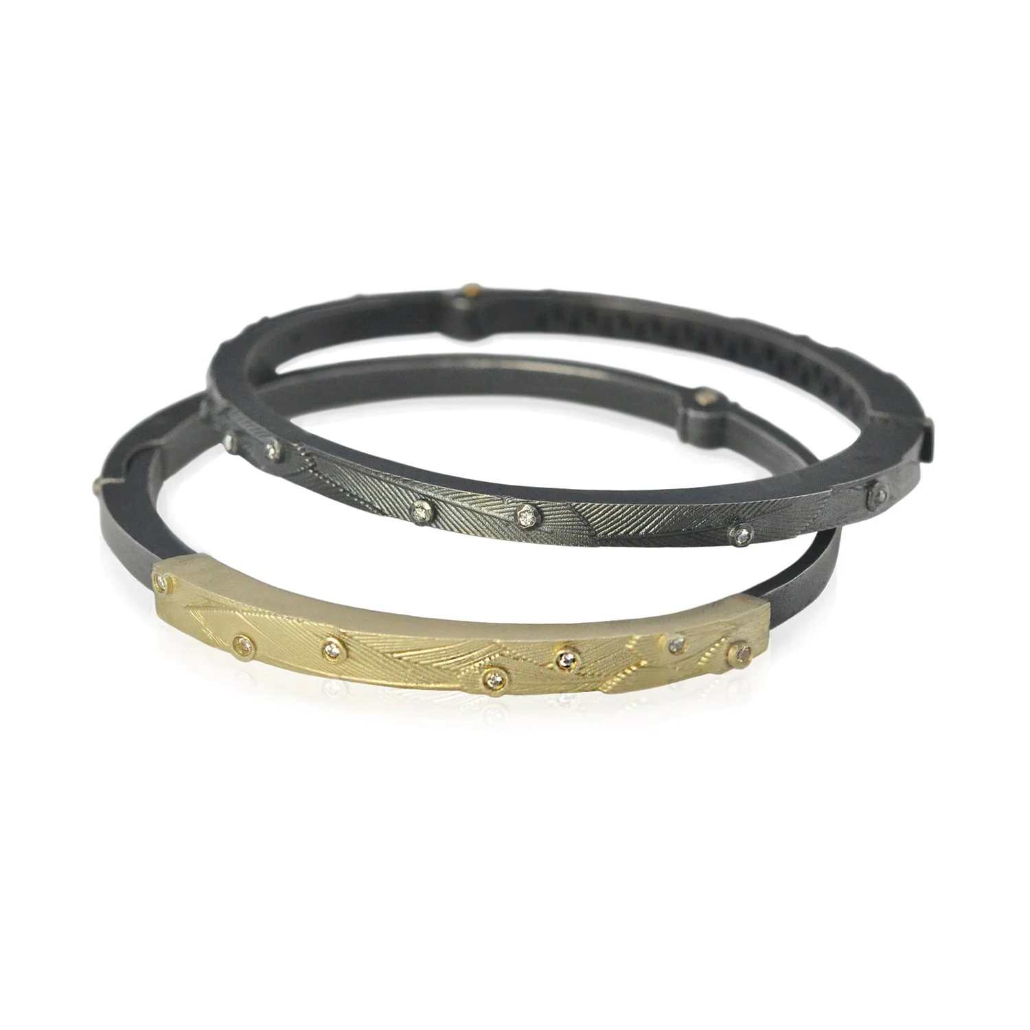 Hinged Feather Bracelets. 14k yellow gold, tube set diamonds, oxidized sterling silver. Handmade fine art jewelry by Rebecca Myers Design.