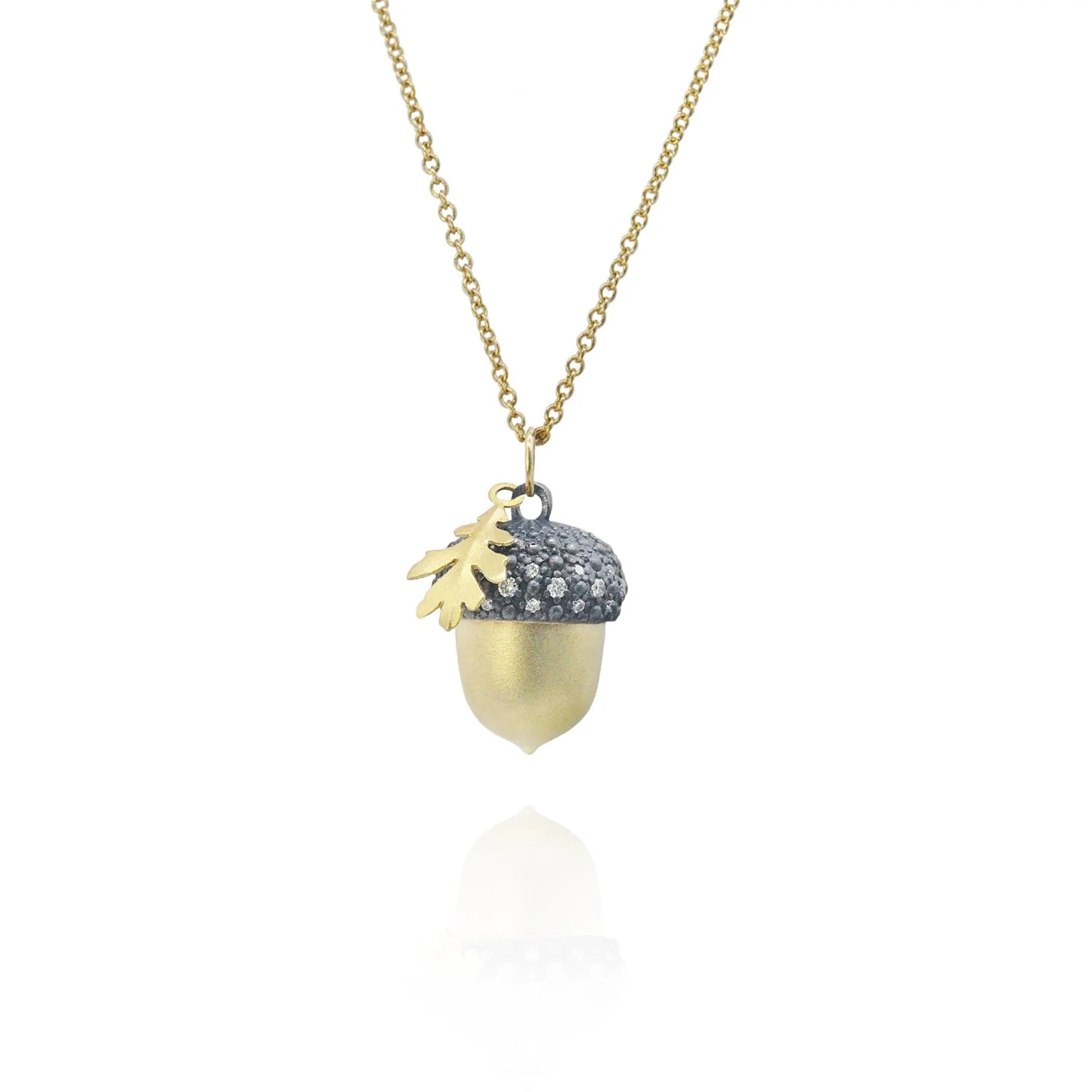 Small Acorn on Thin Cable Chain. 14k yellow gold, oxidized silver, pave set white diamonds. Handmade fine art jewelry by Rebecca Myers Design.