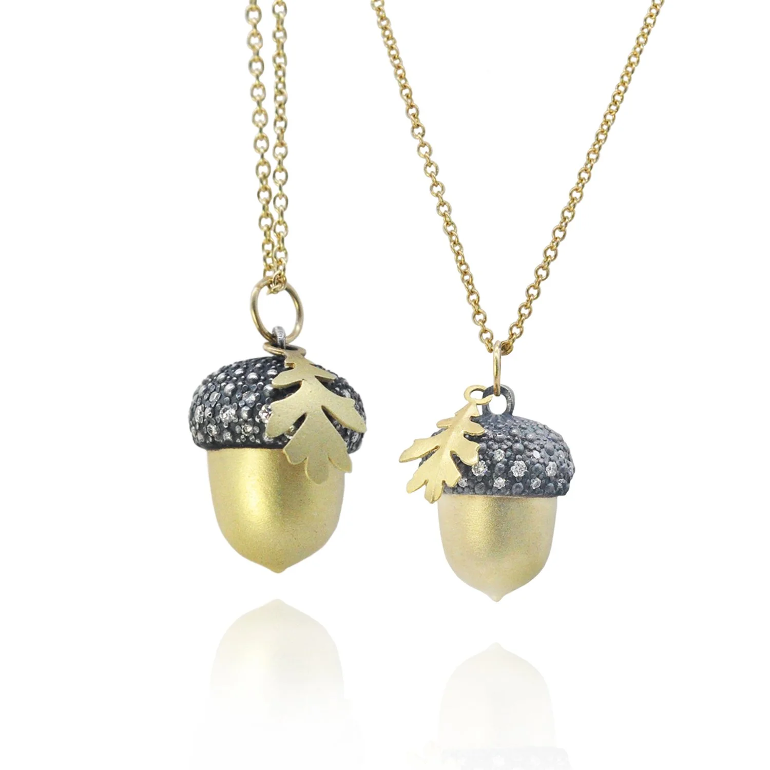 Large & Small Acorn Pendants on Thin Cable Chain. 14k yellow gold, oxidized silver, pave set white diamonds. Handmade fine art jewelry by Rebecca Myers Design.