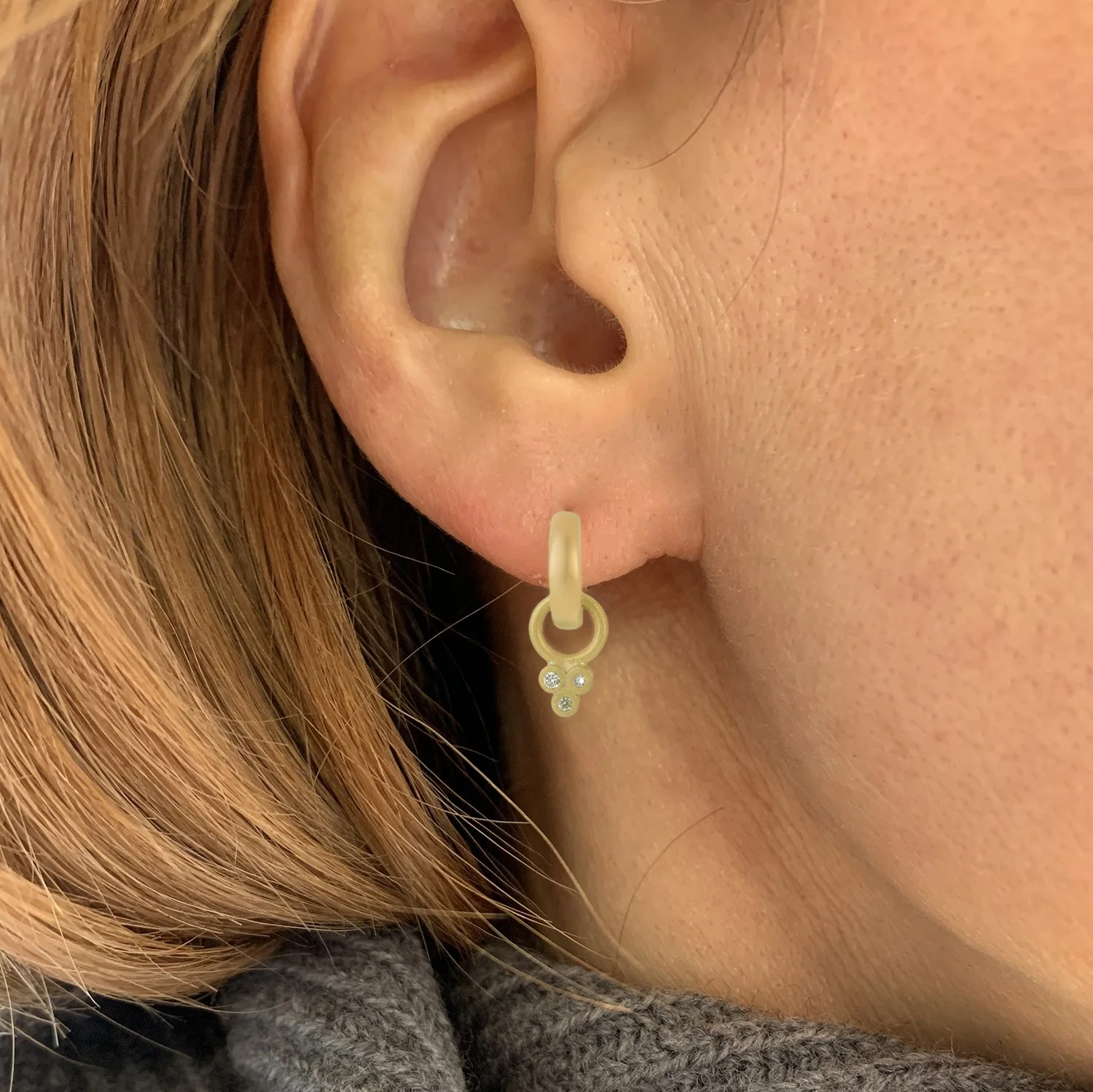 Huggie Hoops with Trefoil Diamonds 2, lifestyle WEB.jpg