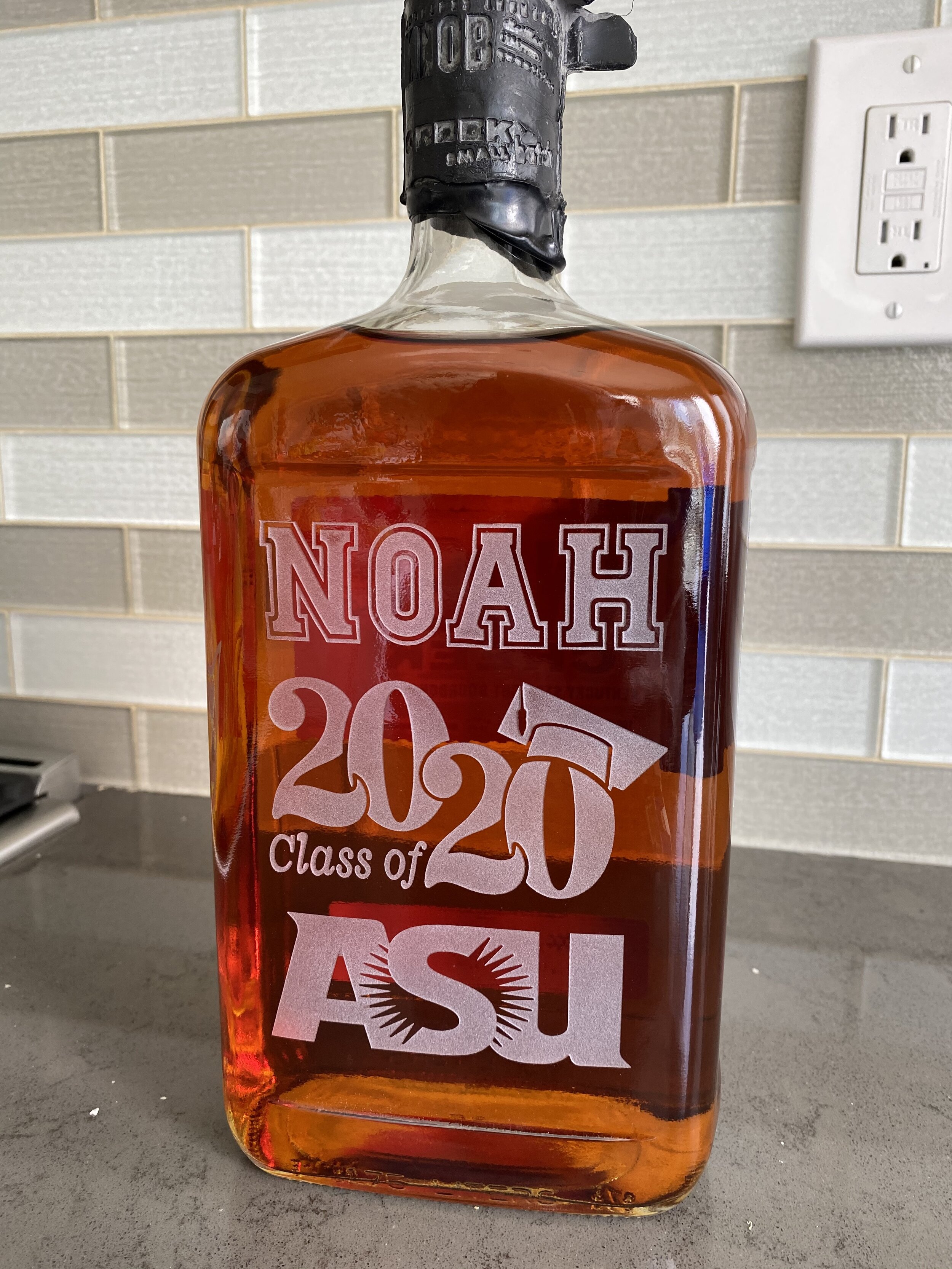 ASU and Grad Logo on Whiskey Bottle