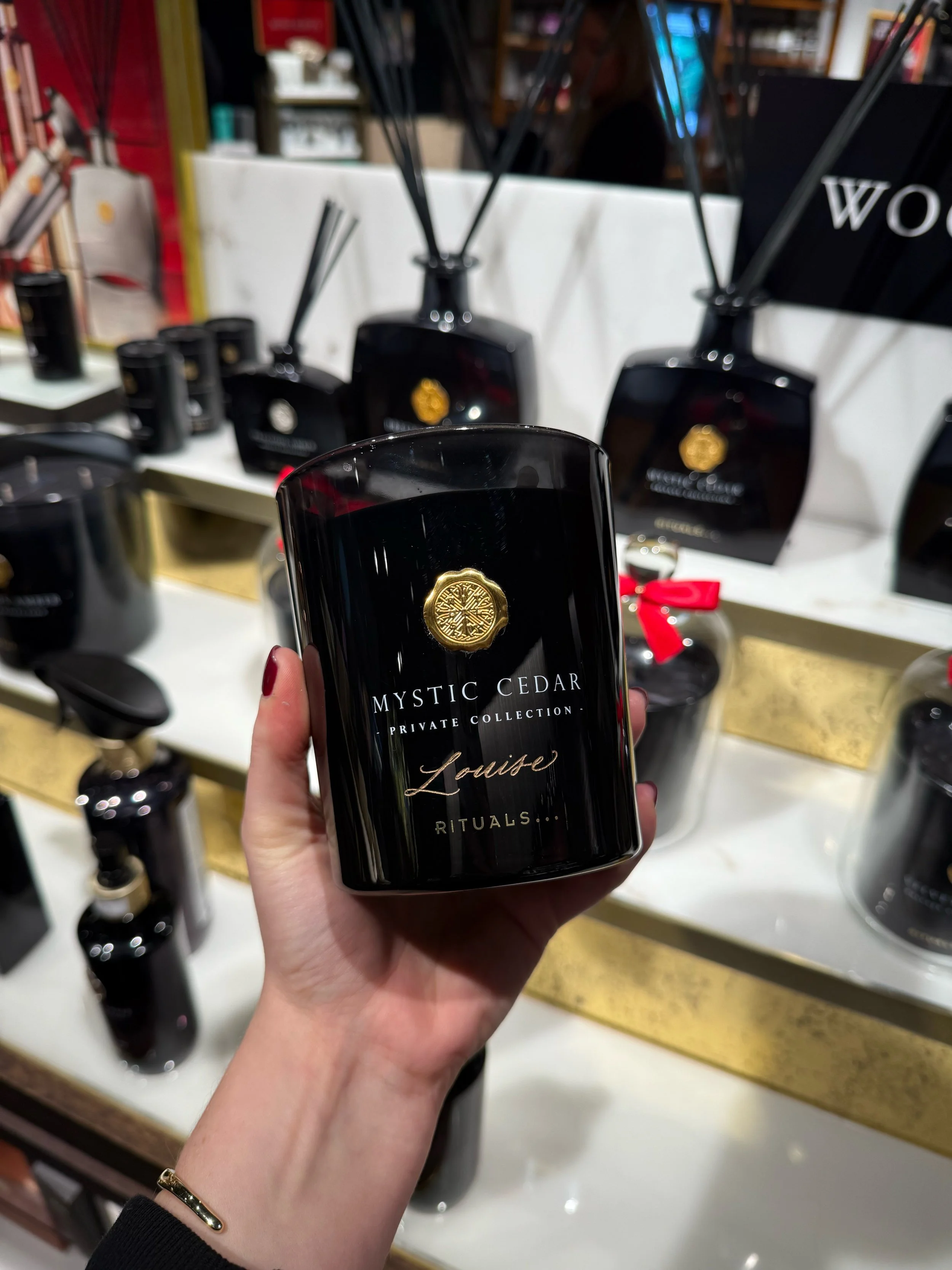 Hand engraved glass candle for Rituals cosmetics. Live calligraphy engraving London and Essex