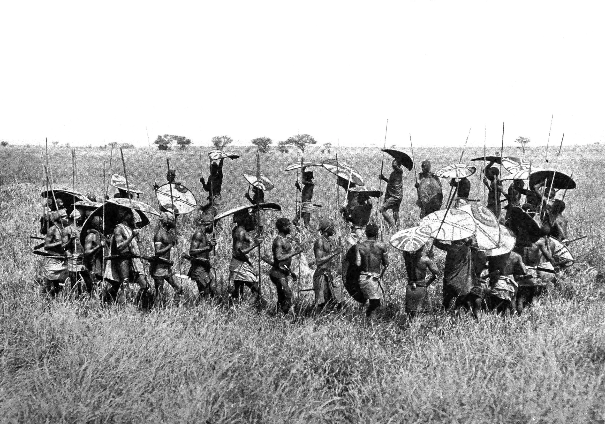 Lumbwa Warriors doing a ceremony around a lion's body