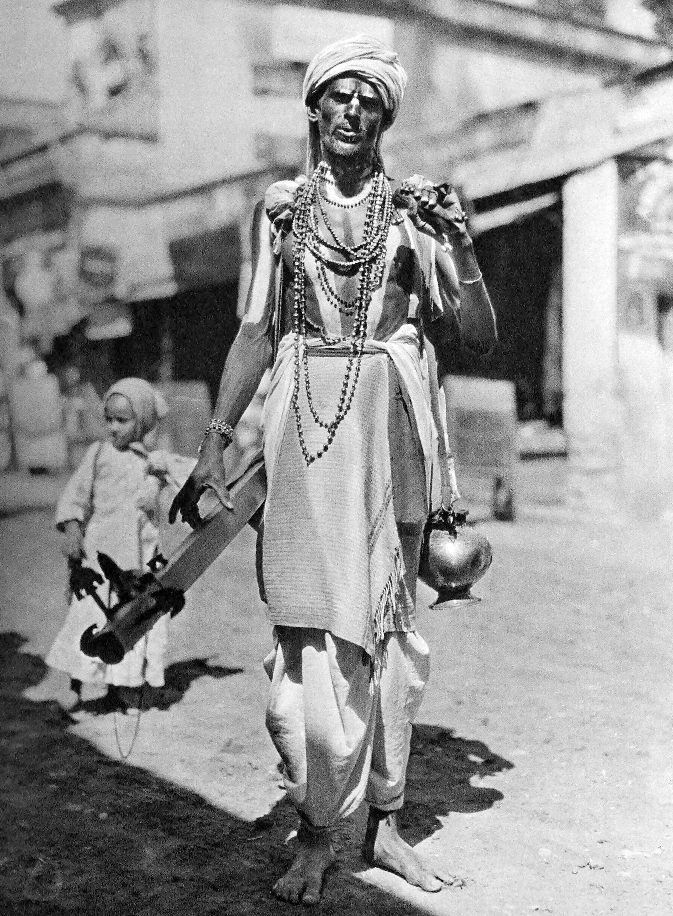 Bangalore. Hindu Mendicant Monk as Street Singer