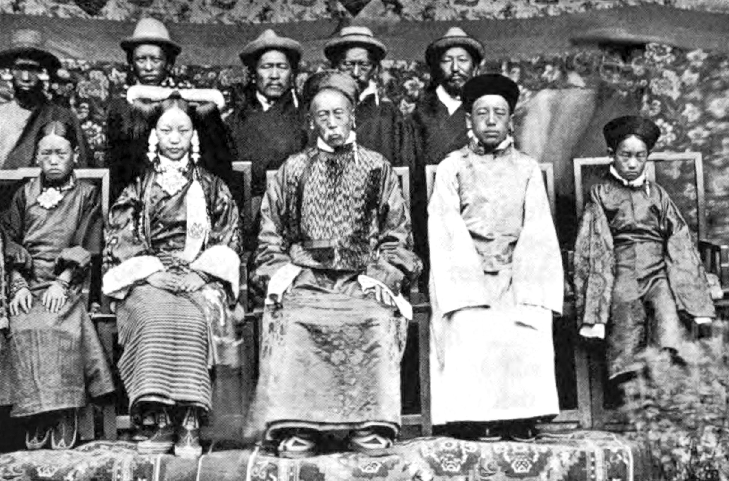 Tibetan nobleman with wife and children seated