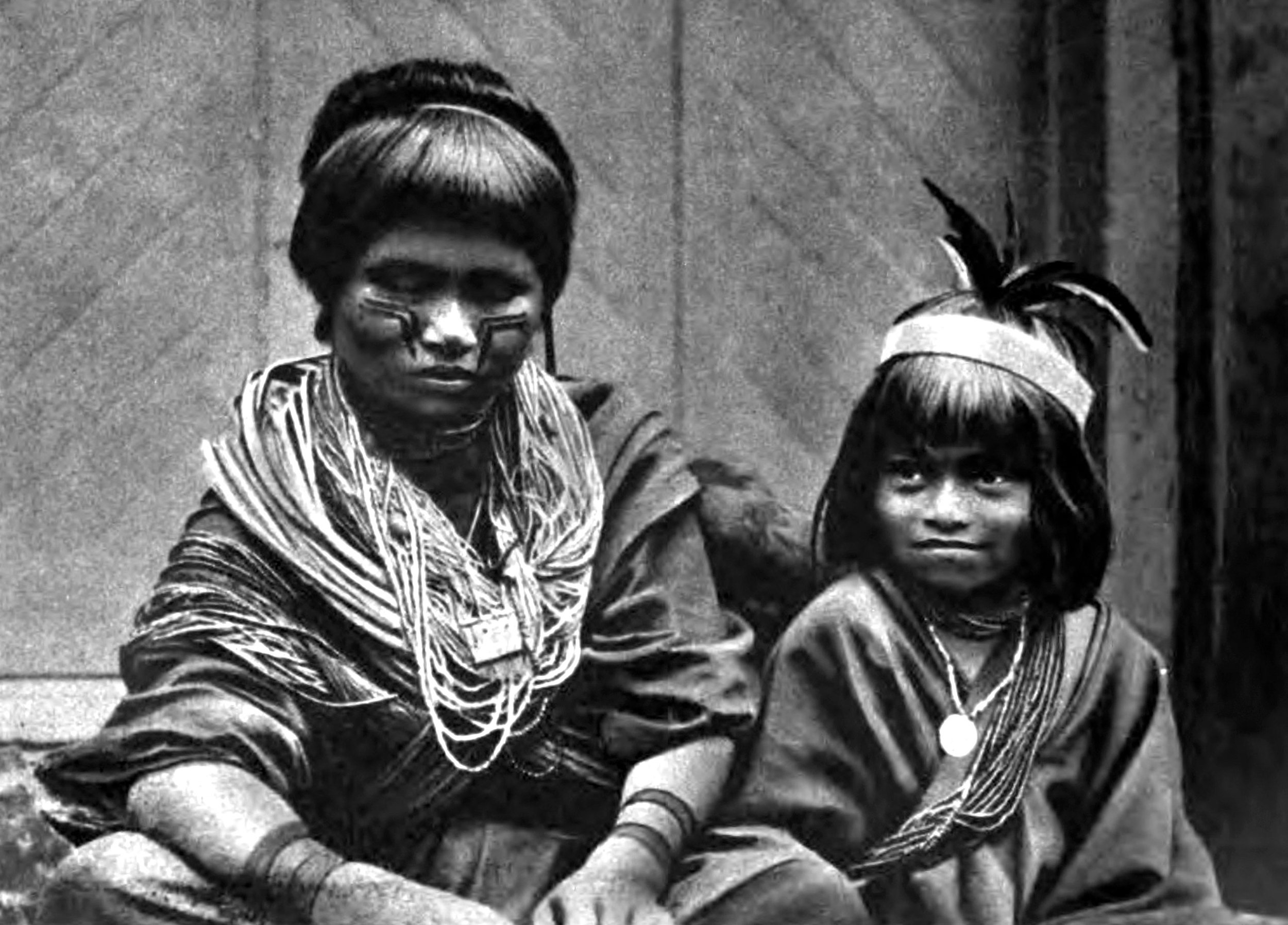 Peru-there are people of importance, it is shown by the masses of beads worn by this Campa lady and her little daughter