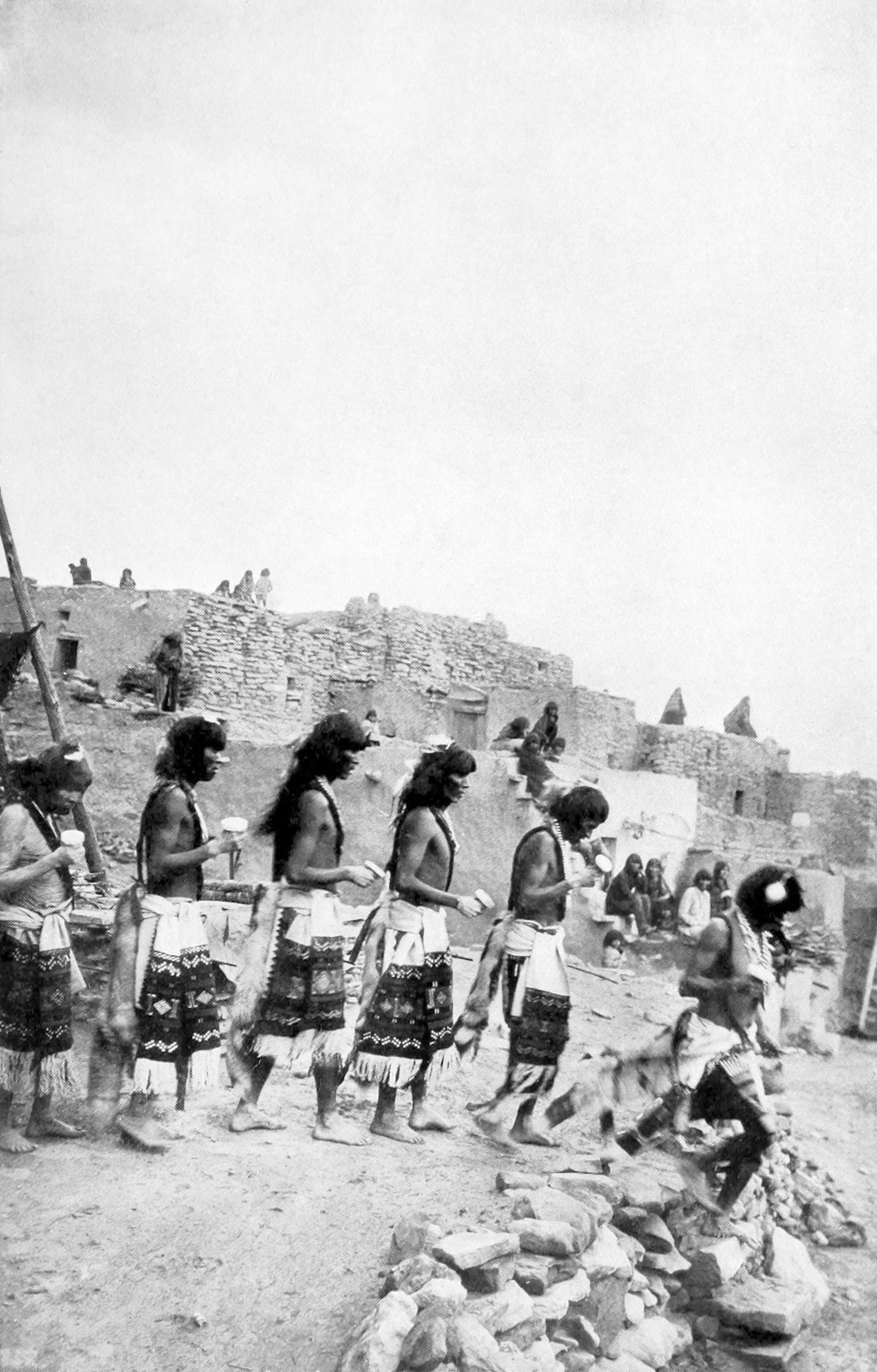 The Antelope priests emerging from their kiva to go to the plaza on the eighth day for the public performance