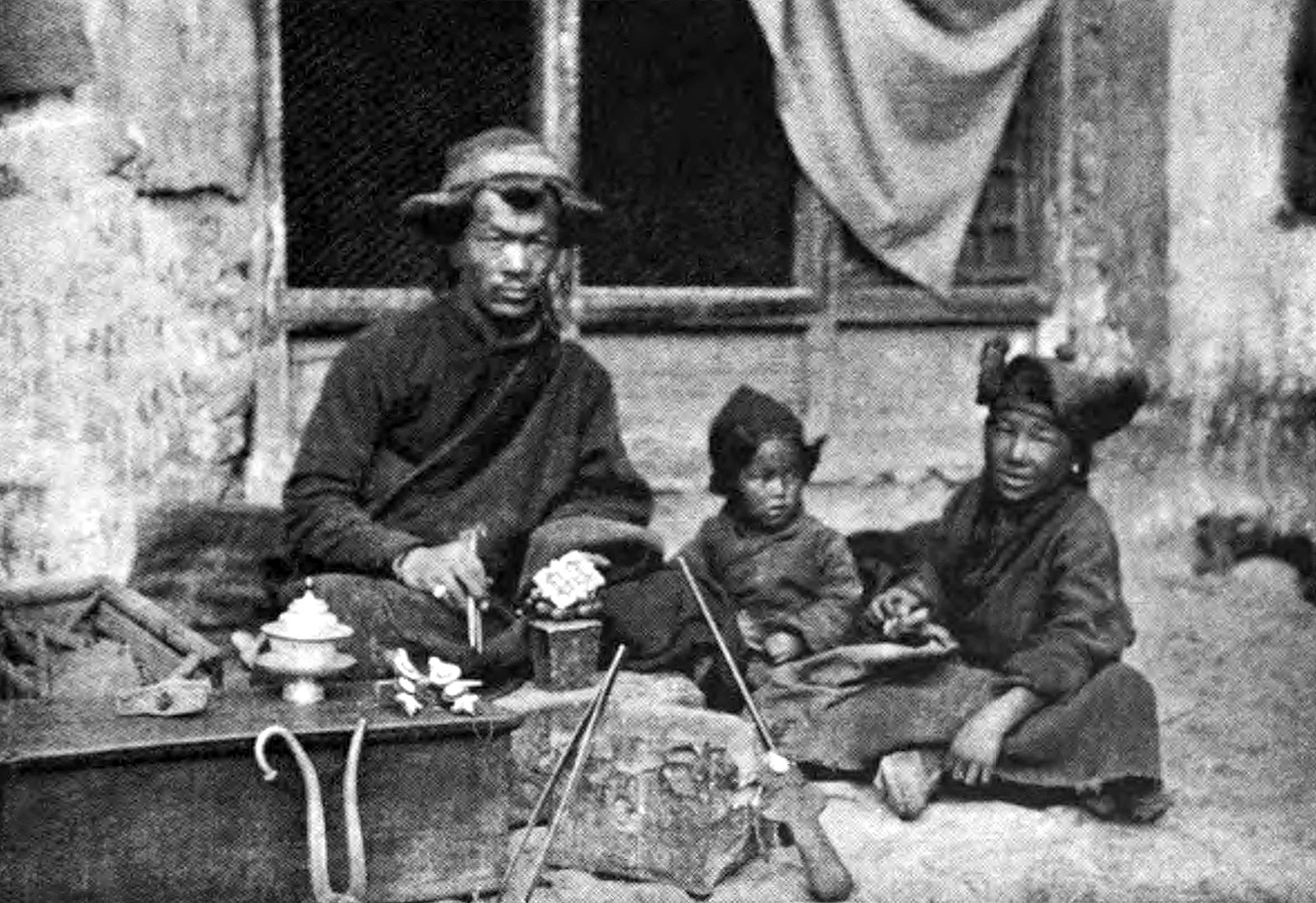 Silversmith in Lhasa engraving a charm-box