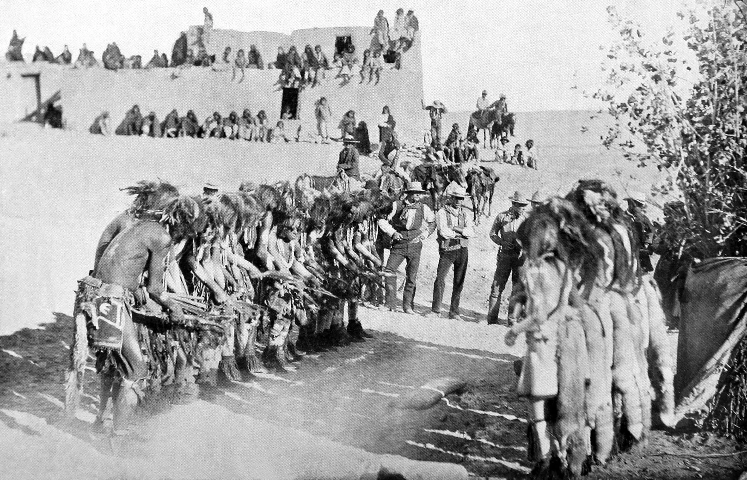 Both platoons performing, the Snake dancers making the lateral motions to the time of the humming of a song.
