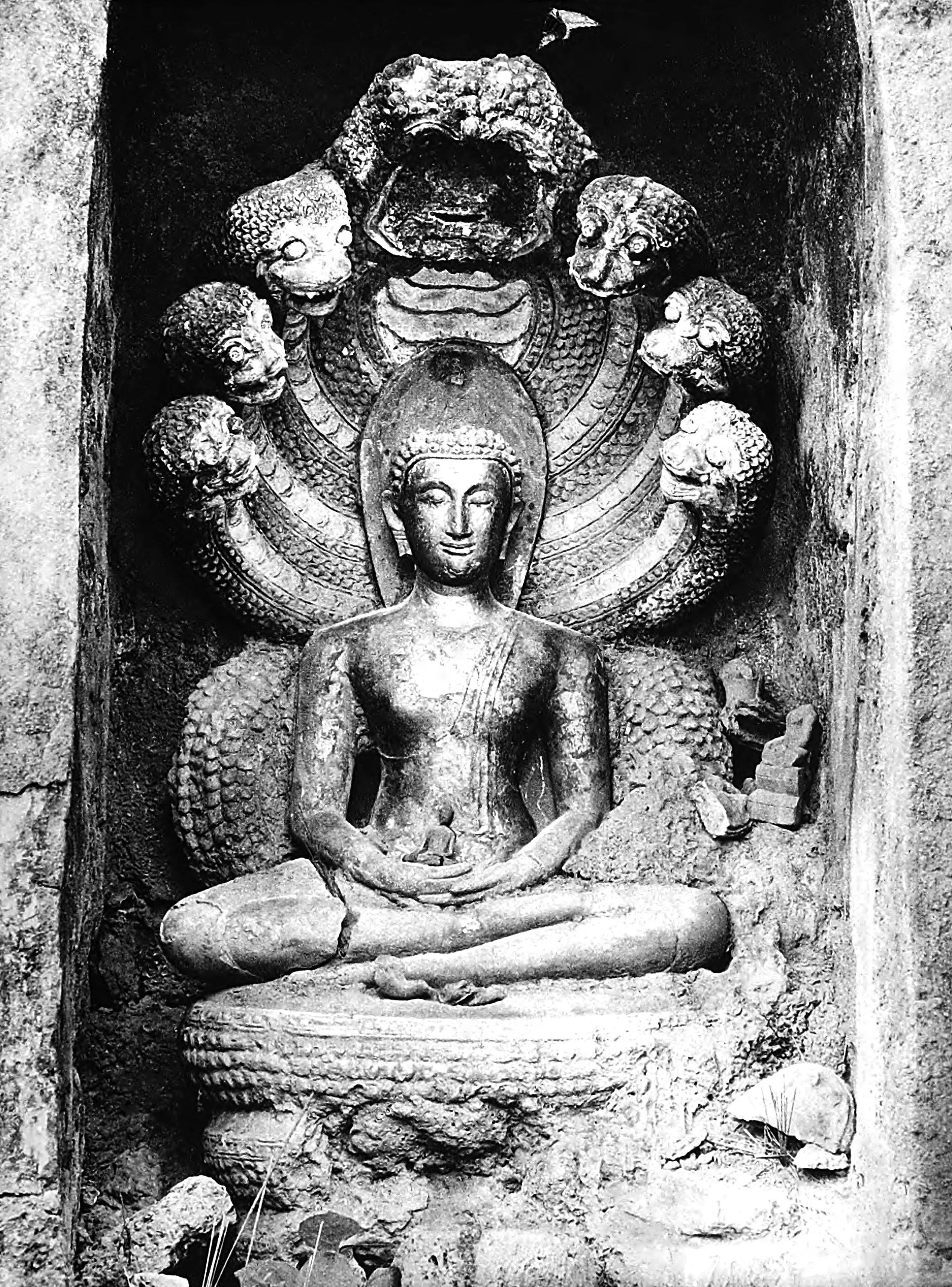Buddha with Serpents Heads in the ruins of Sawankaloke